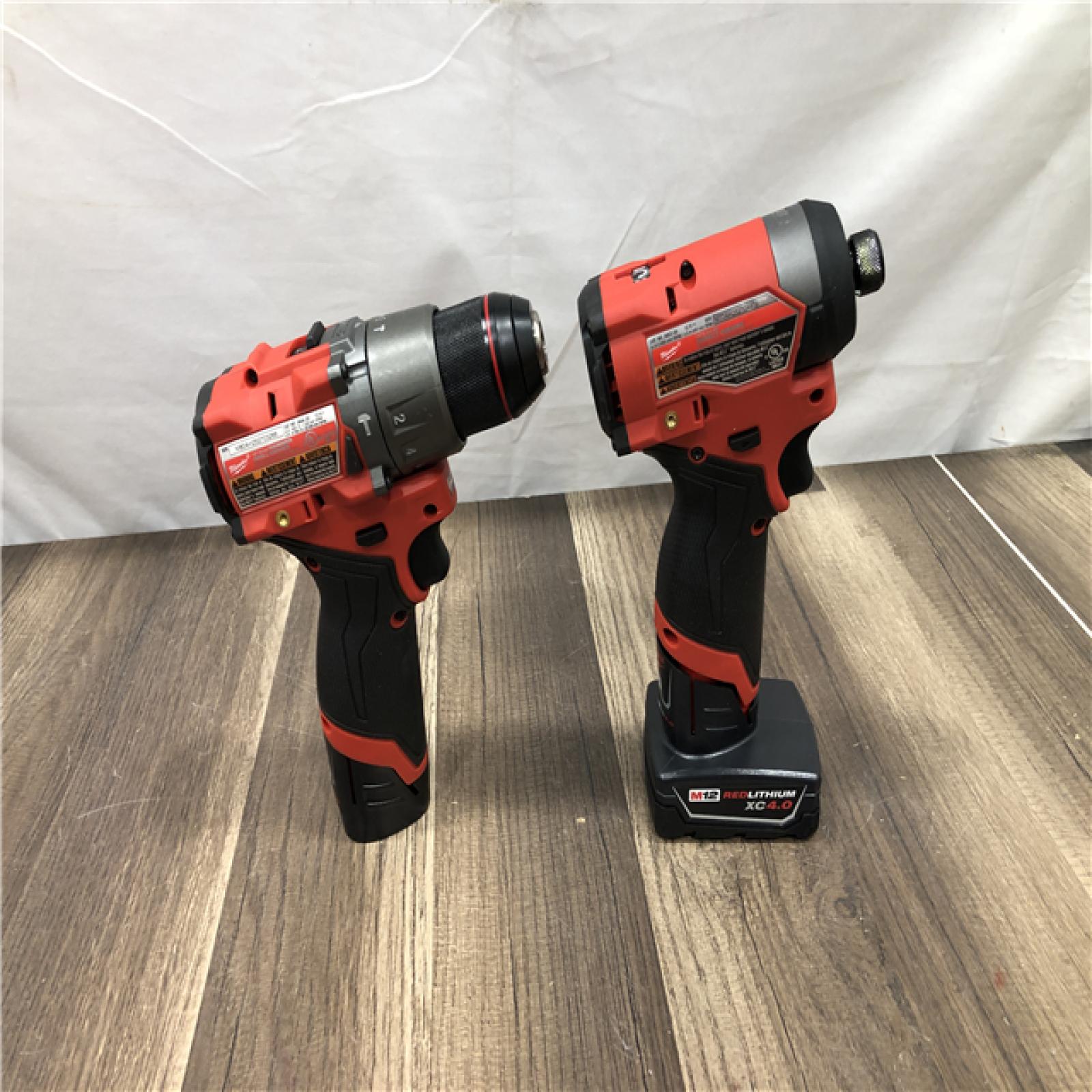 AS-IS Milwaukee FUEL 12-Volt Lithium-Ion Brushless Cordless Hammer Drill and Impact Driver Combo Kit