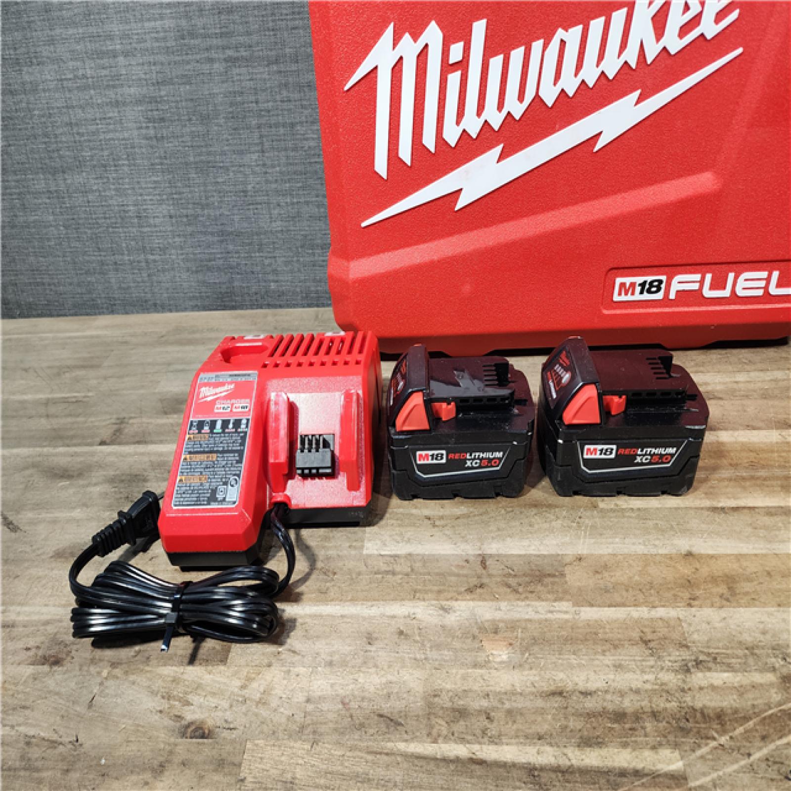 HOUSTON LOCATION - AS-IS Milwaukee M18 FUEL 18V Lithium-Ion Brushless Cordless Hammer Drill and Impact Driver Combo Kit