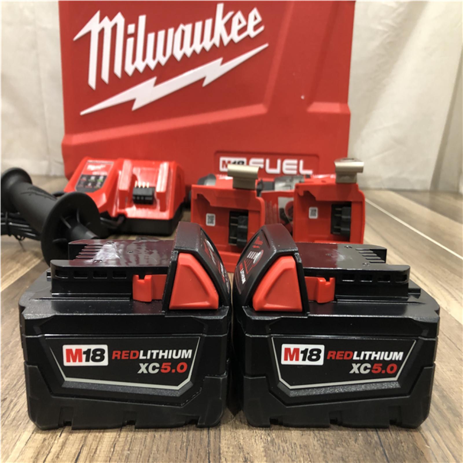 AS-IS Milwaukee FUEL 18V Lithium-Ion Brushless Cordless Hammer Drill and Impact Driver Combo Kit