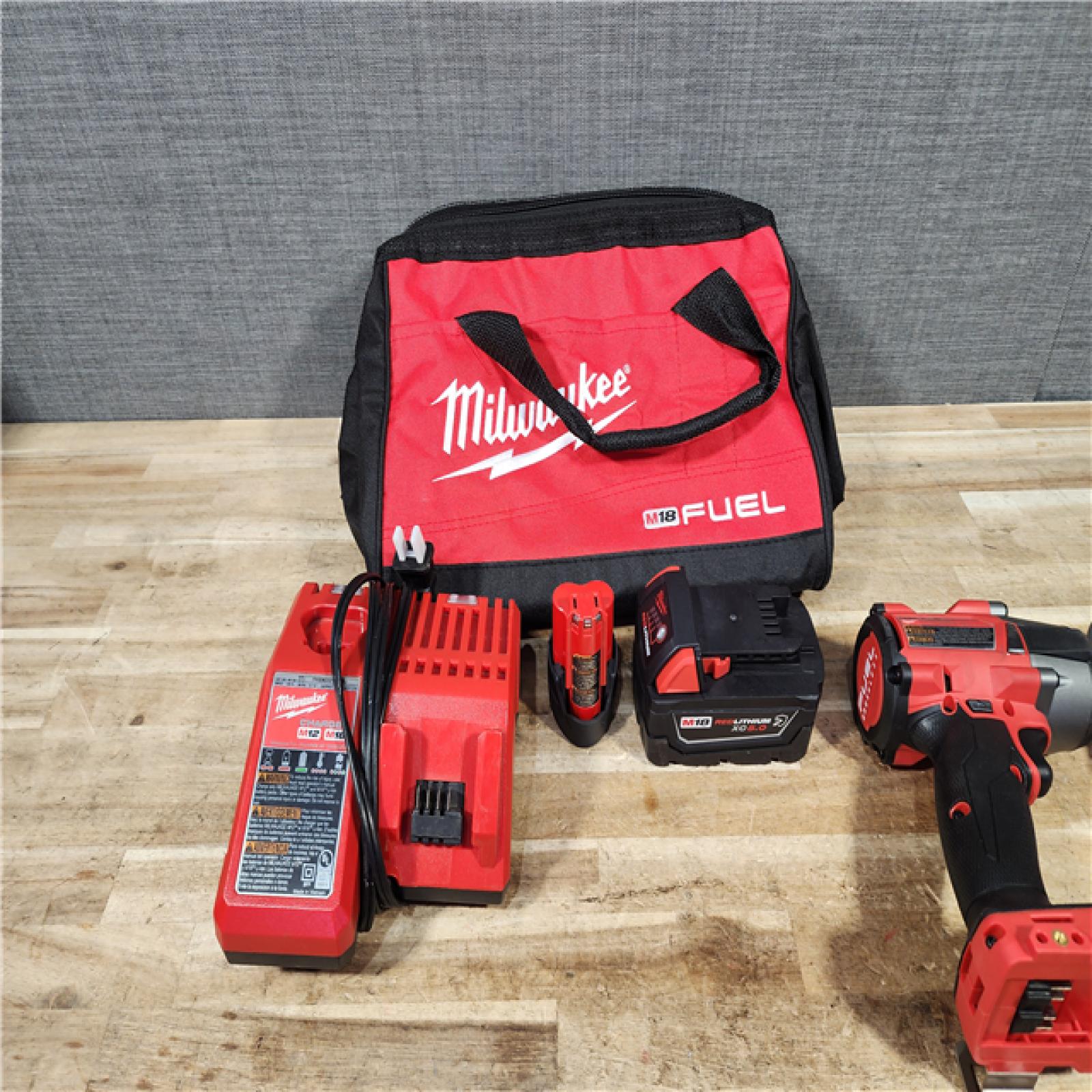 HOUSTON LOCATION - AS - IS M18 FUEL 18V Cordless Mid Torque 1/2 in. Impact Wrench W/ M12 FUEL 3/8 in. Ratchet & Battery/Charger Combo Kit