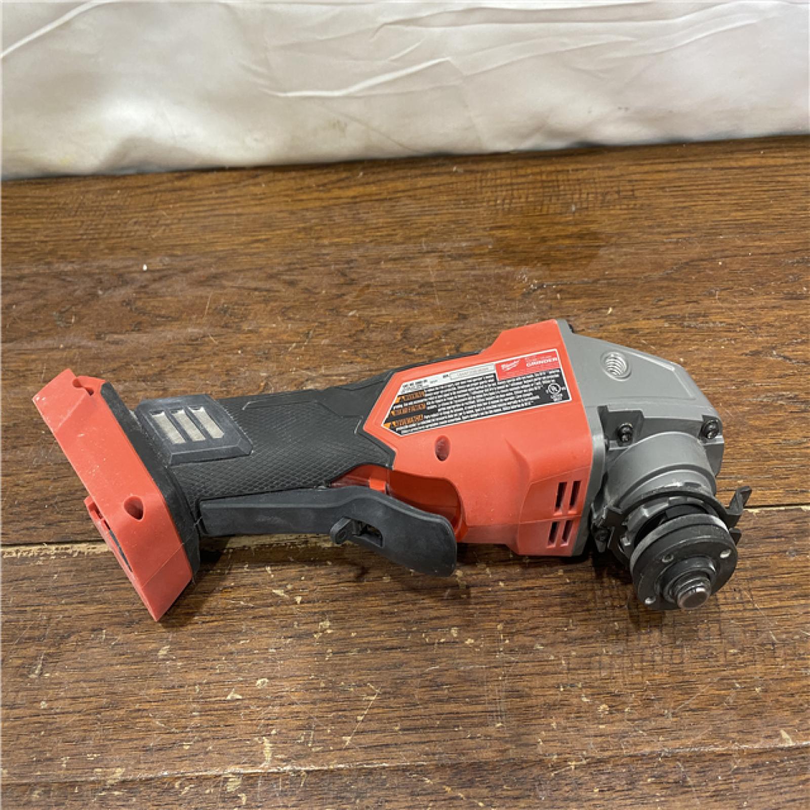 AS-IS Milwaukee 2880-20 M18 FUEL 18-Volt Lithium-Ion Brushless Cordless 4-1/2 in./5 in. Grinder W/Paddle Switch (Tool-Only)