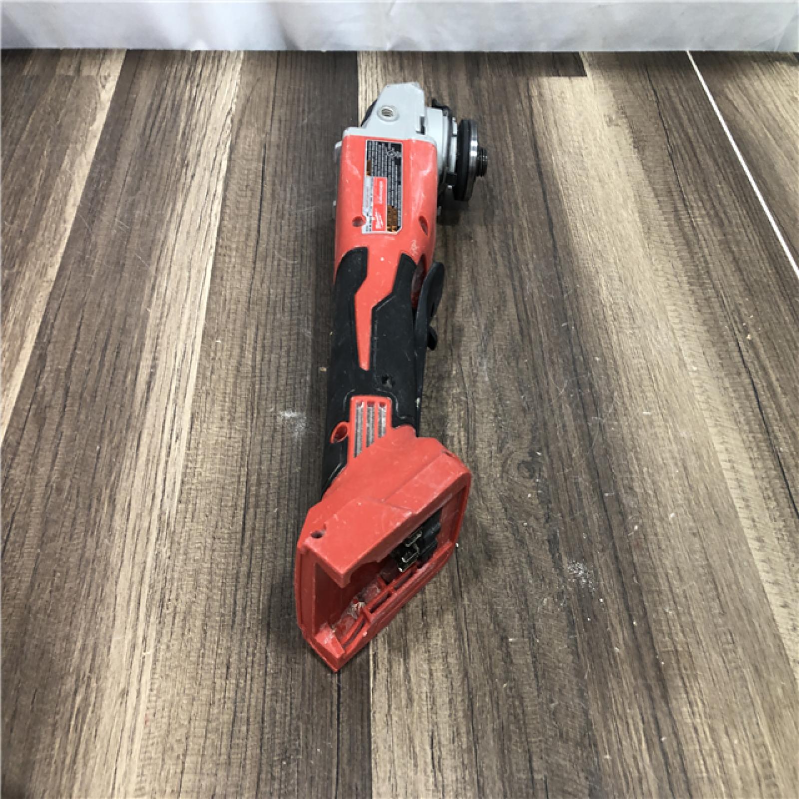 AS-IS Milwaukee 18V Lithium-Ion Brushless Cordless 4-1/2 in./5 in. Grinder w/Paddle Switch (Tool-Only)