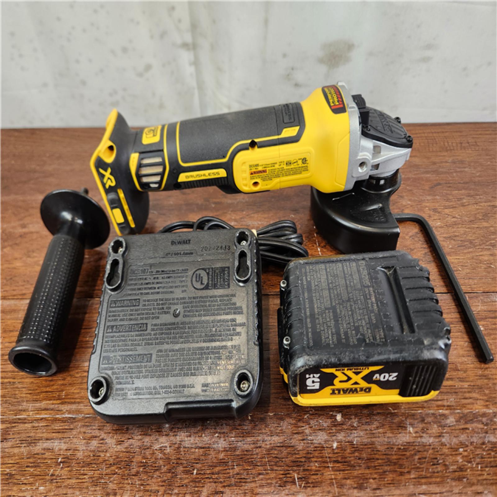 AS-IS DEWALT 20V MAX XR Brushless Cordless 4-1/2 in. Small Angle Grinder w/ (1) Battery And Charger