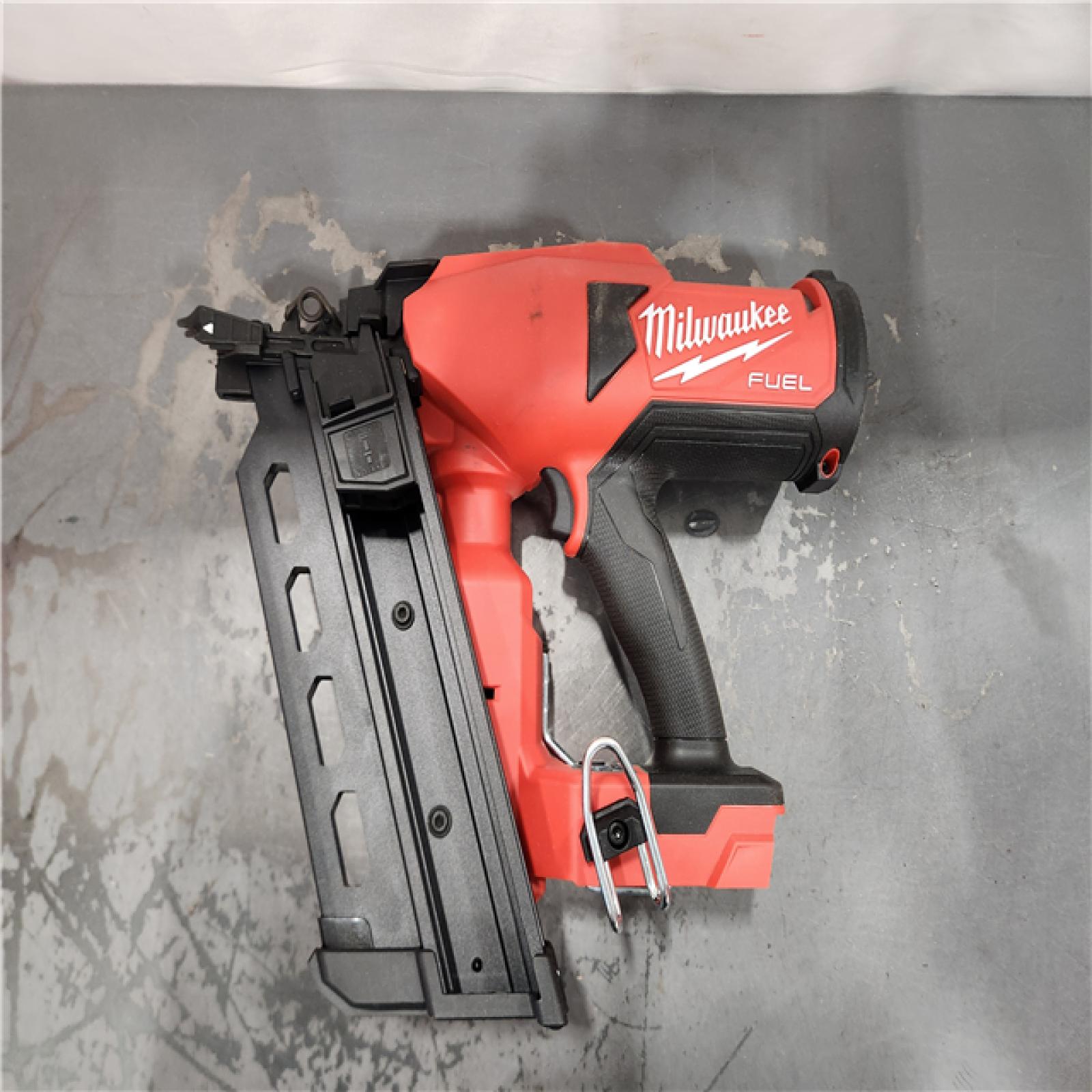 AS-IS- Nail Gun Cordless Strip Plastic 18 V