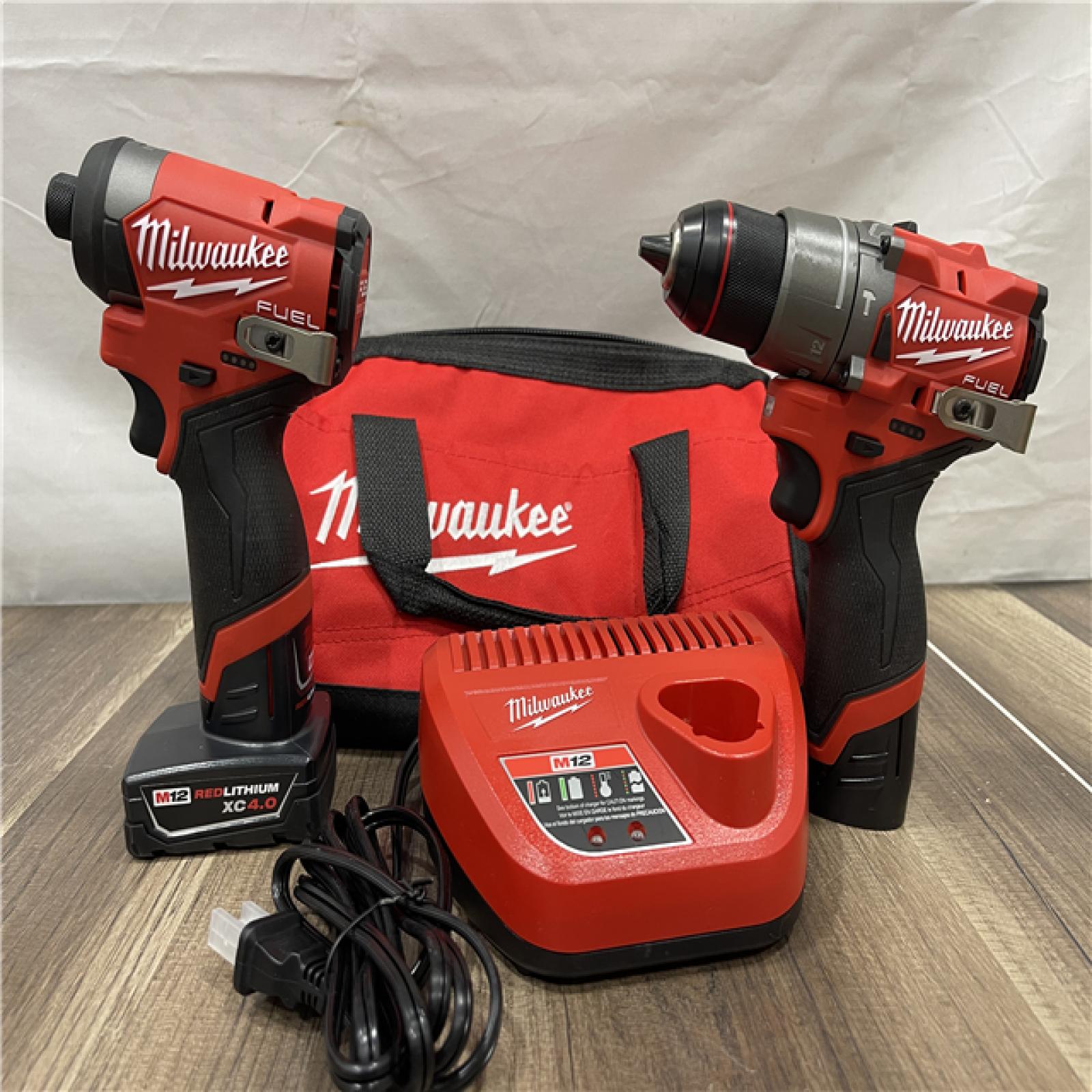 AS-IS Milwaukee FUEL 12-Volt Lithium-Ion Brushless Cordless Hammer Drill and Impact Driver Combo Kit