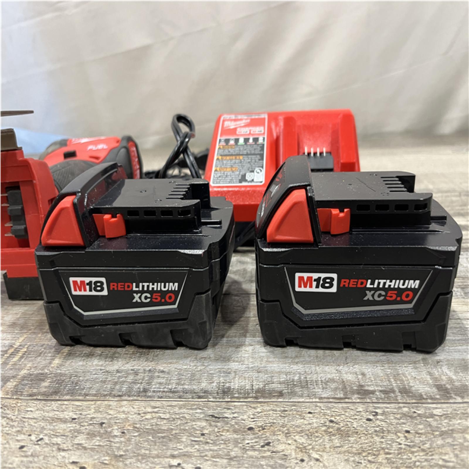 AS-IS Milwaukee FUEL SURGE 18-Volt Lithium-Ion Brushless Cordless 1/4 in. Hex Impact Driver Compact Kit