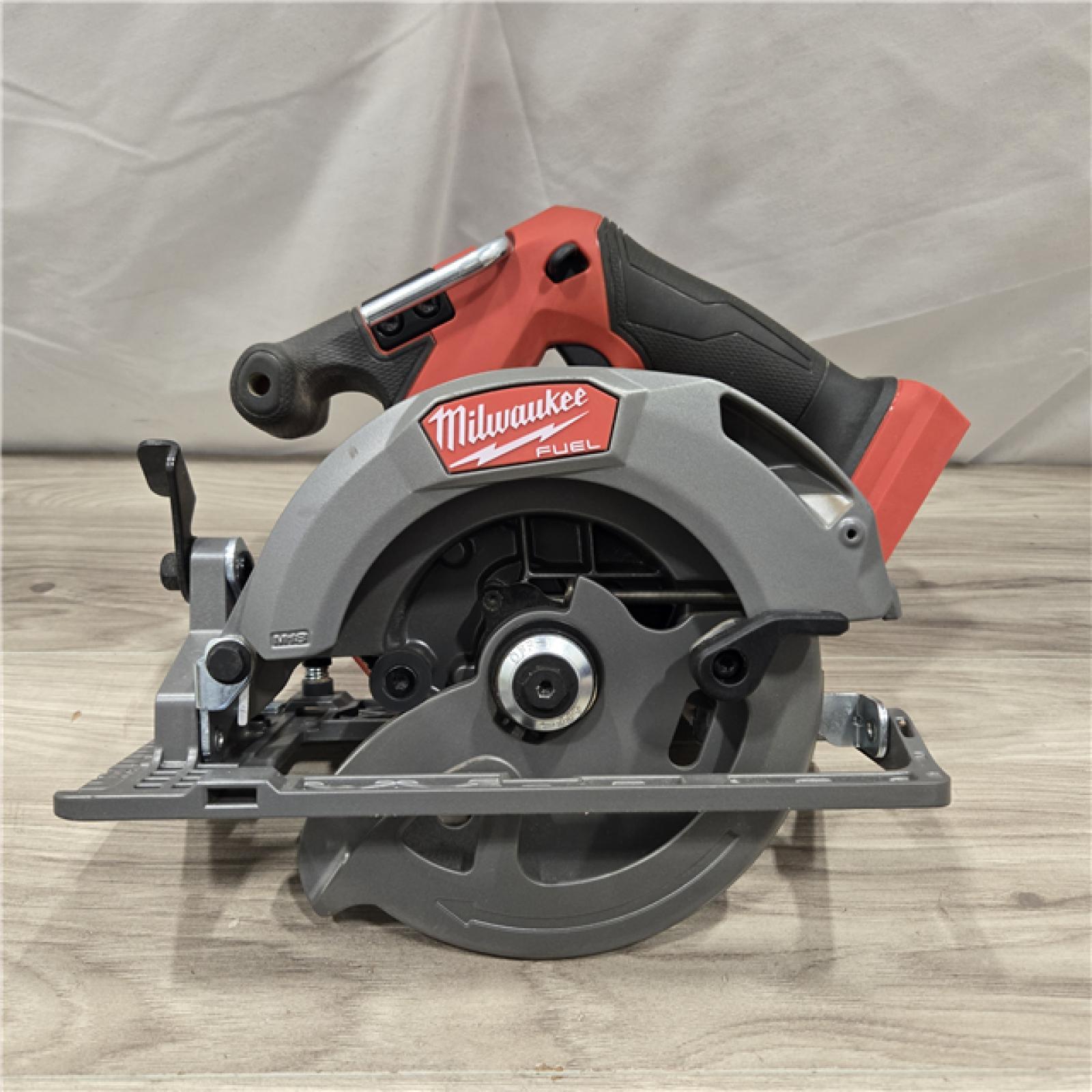 AS-IS Milwaukee M18 FUEL 18V  Cordless 6-1/2 in. Circular Saw (Tool-Only)