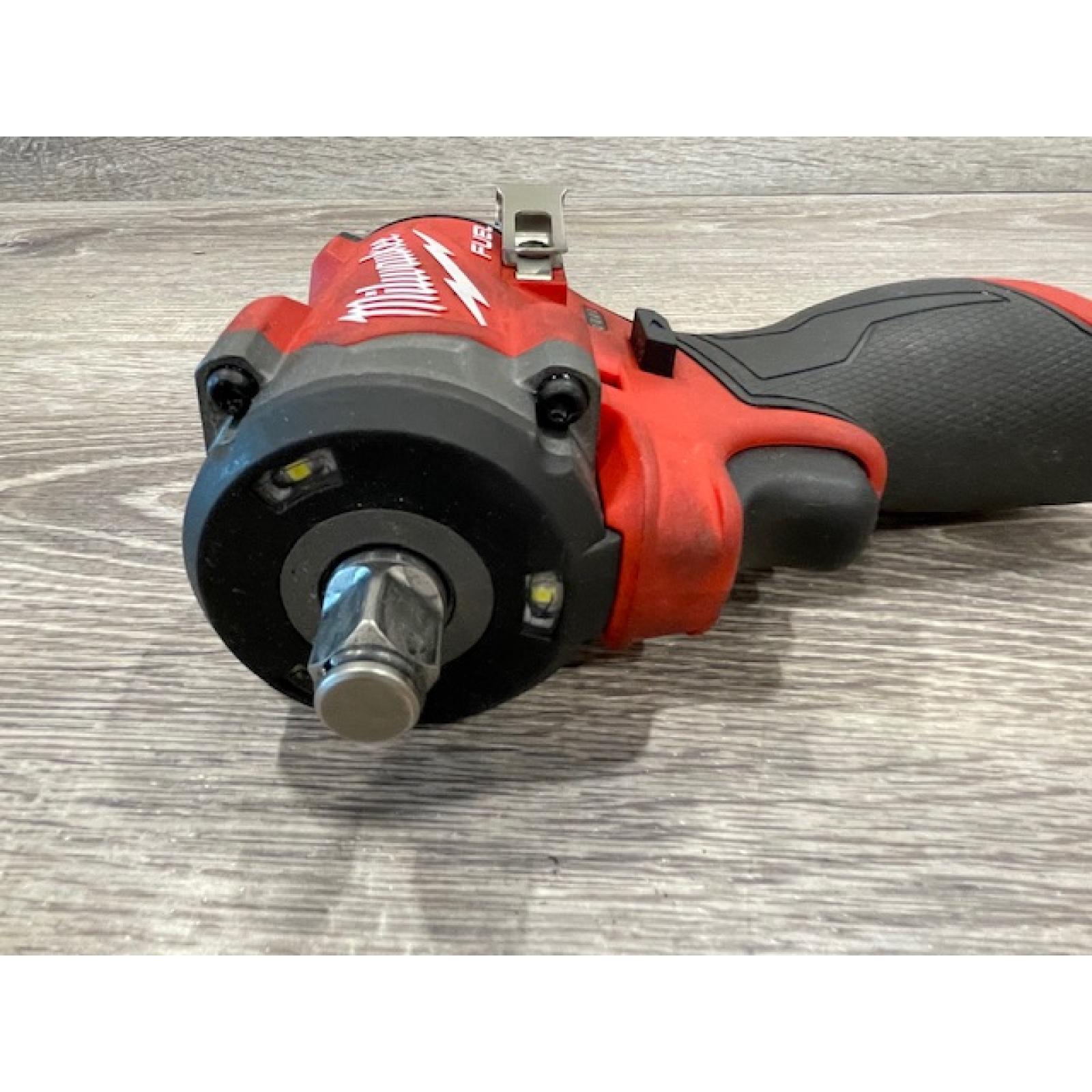 AS-IS Milwaukee FUEL 12V Lithium-Ion Brushless Cordless Stubby 1/2 in. Impact Wrench (Tool-Only)