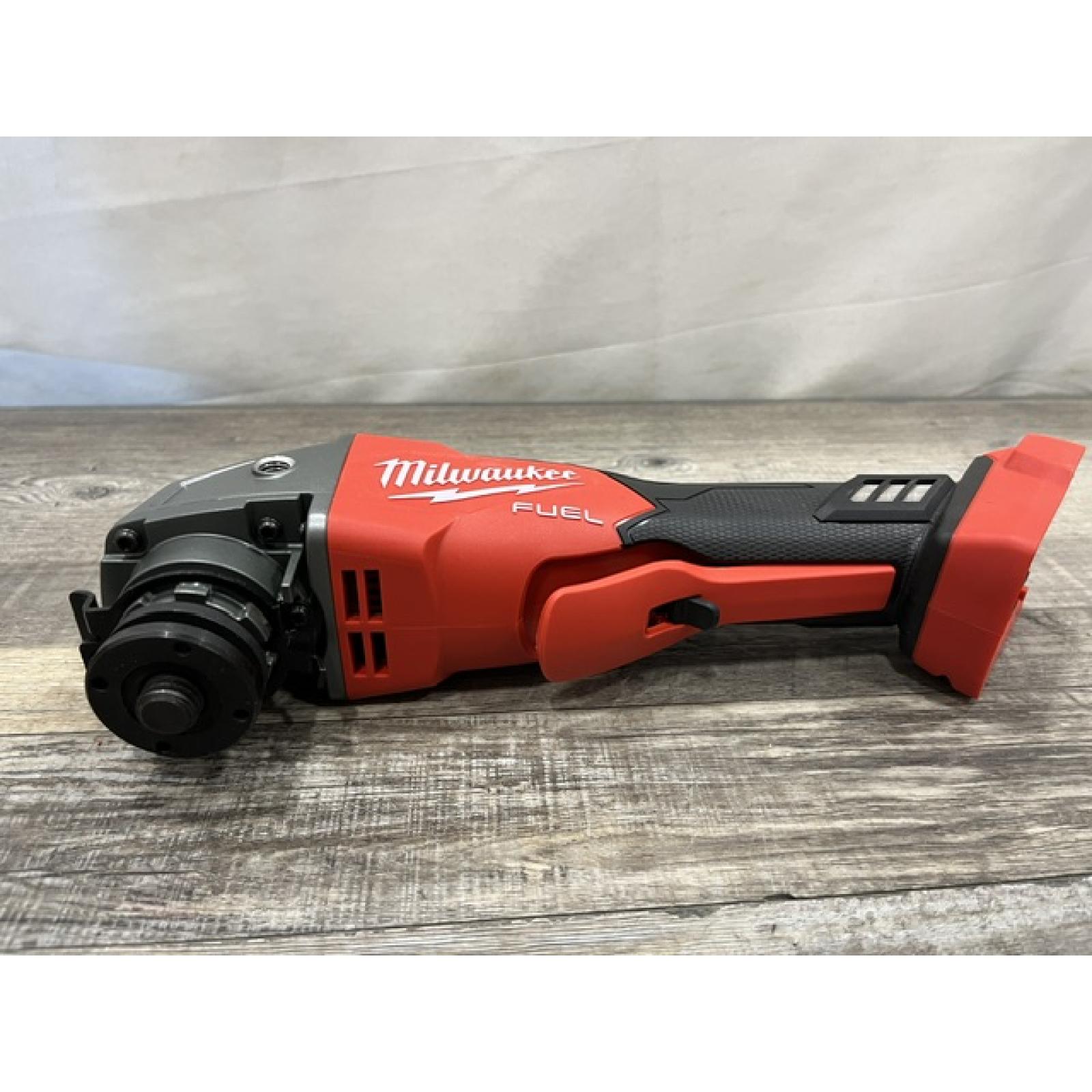 AS-IS Milwaukee FUEL 18V Lithium-Ion Brushless Cordless 4-1/2 in./5 in. Grinder w/Paddle Switch (Tool-Only)