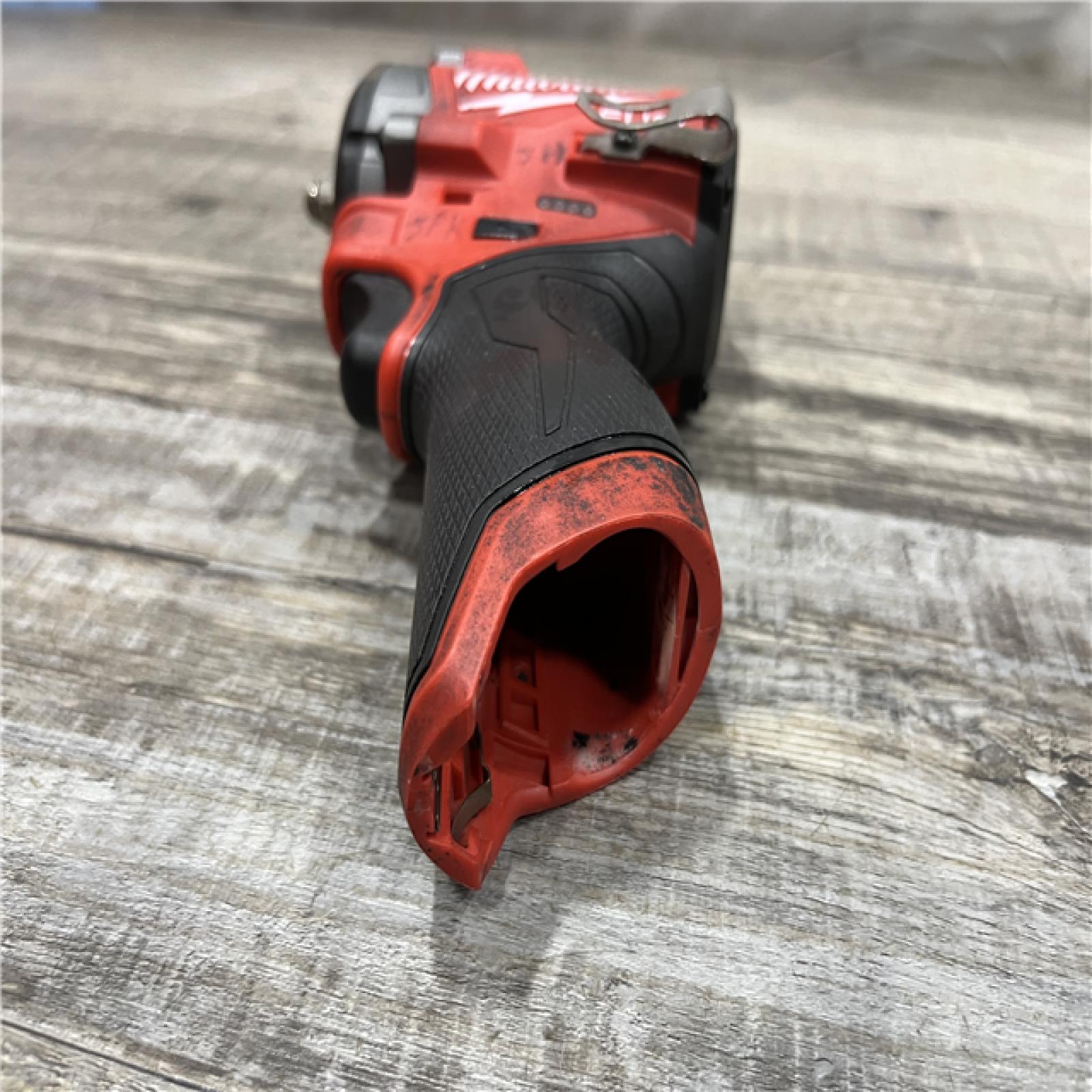 AS-IS Milwaukee FUEL 12V Lithium-Ion Brushless Cordless Stubby 3/8 in. Impact Wrench (Tool-Only)