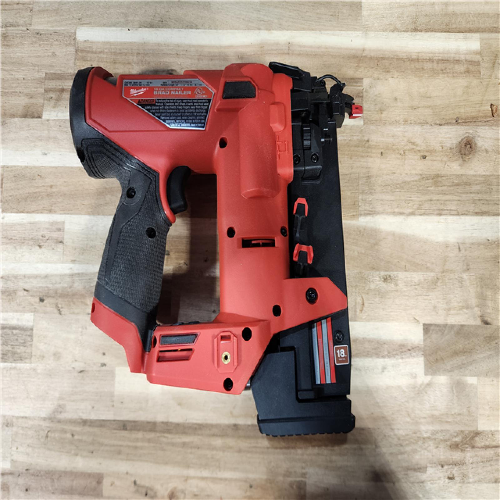 HOUSTON LOCATION - AS-IS Milwaukee FUEL 12-Volt Lithium-Ion Brushless Cordless 18-Gauge 1-1/2 in. Compact Brad Nailer (Tool Only)