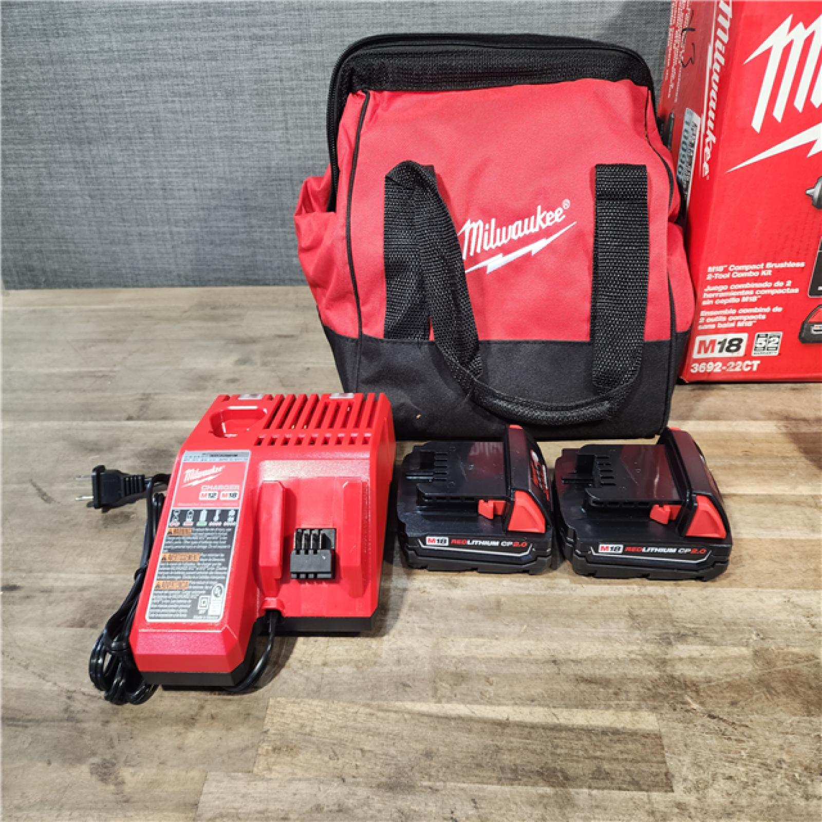 HOUSTON LOCATION - AS-IS Milwaukee M18 18V Lithium-Ion Brushless Cordless Compact Drill/Impact Combo Kit (2-Tool) W/(2) 2.0 Ah Batteries  Charger & Bag