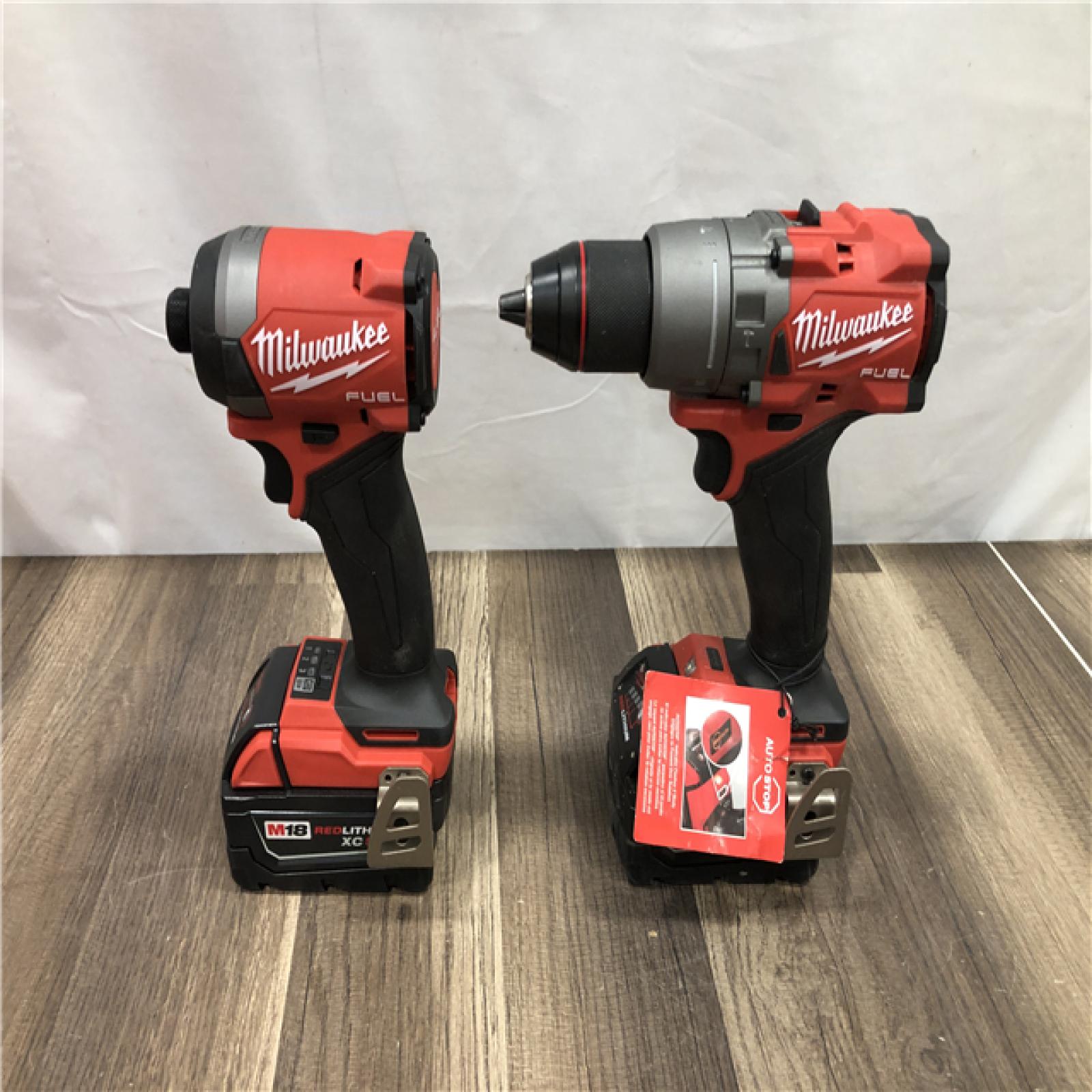AS-IS Milwaukee FUEL 18V Lithium-Ion Brushless Cordless Hammer Drill and Impact Driver Combo Kit