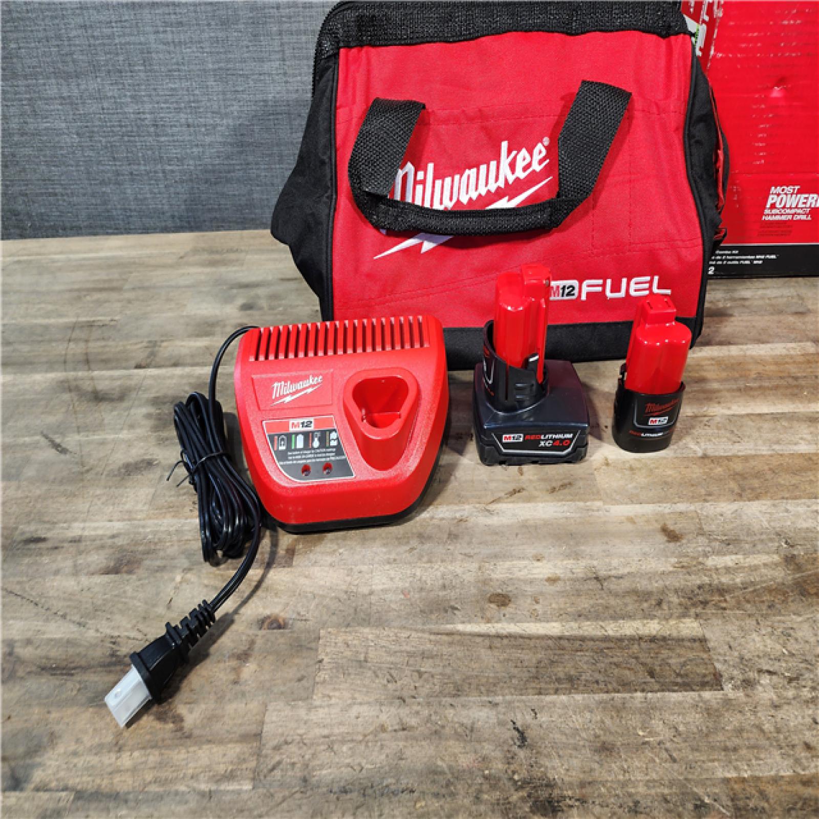 HOUSTON LOCATION - AS-IS Milwaukee 3497-22 12V Brushless Hammer Drill and Impact Driver Combo Kit