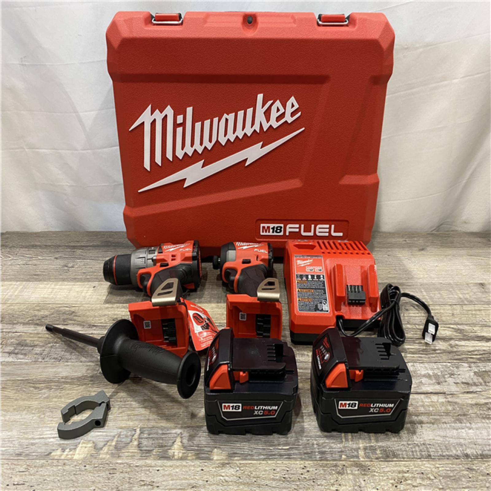 LIKE NEW - Milwaukee FUEL 18V Lithium-Ion Brushless Cordless Hammer Drill and Impact Driver Combo Kit