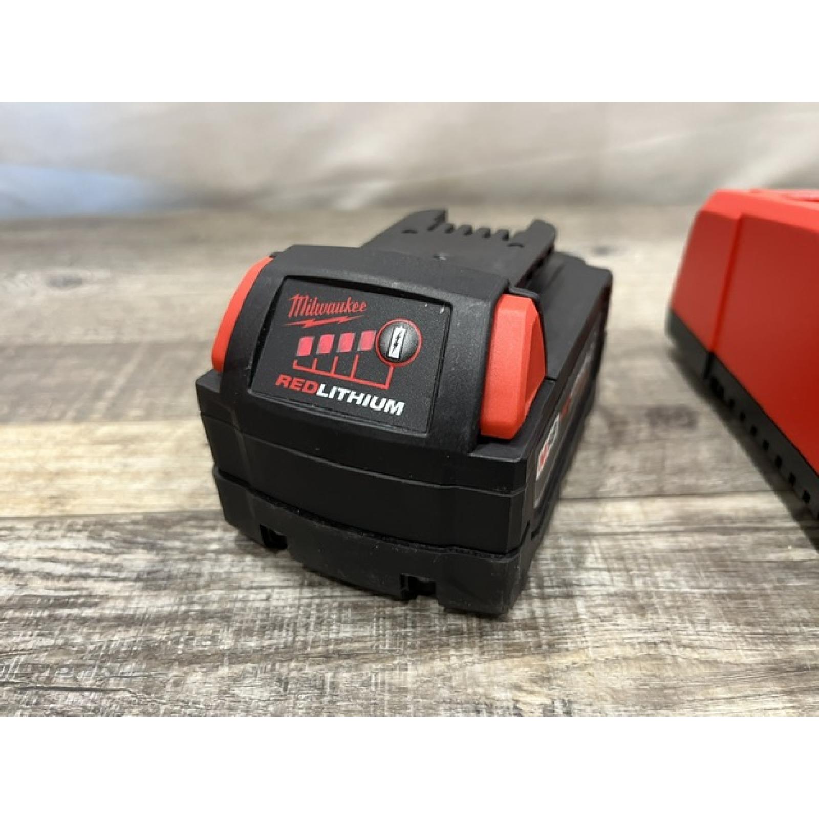 AS-IS Milwaukee 18-Volt Lithium-Ion XC Starter Kit with One 5.0Ah Battery and Charger