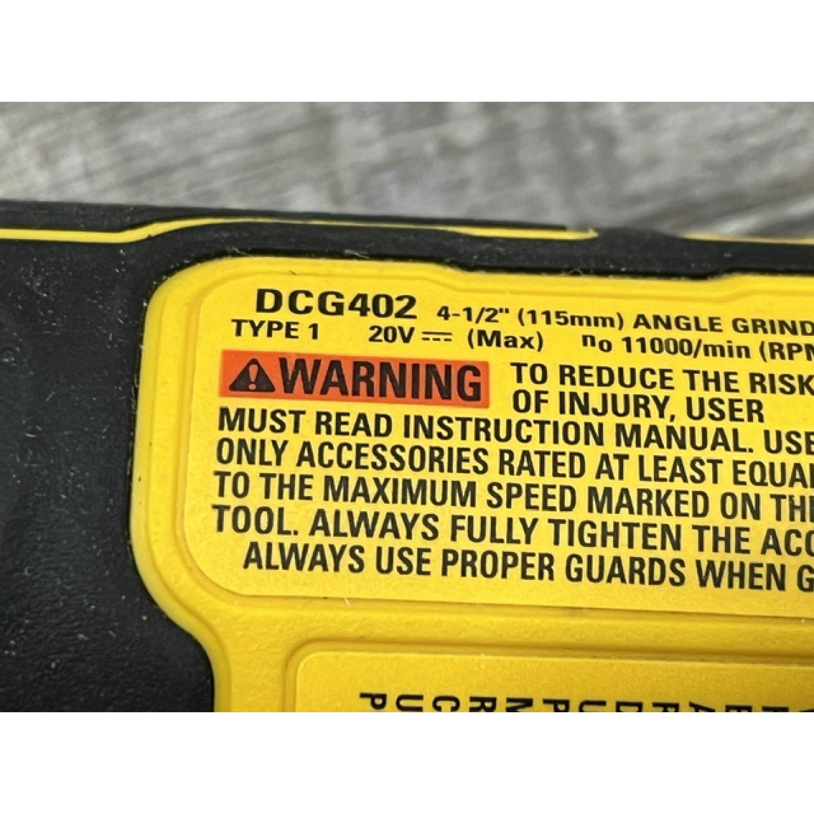 AS-IS DEWALT ATOMIC 20V MAX Cordless 4-1/2 in. Angle Grinder with Paddle Switch (Tool Only)