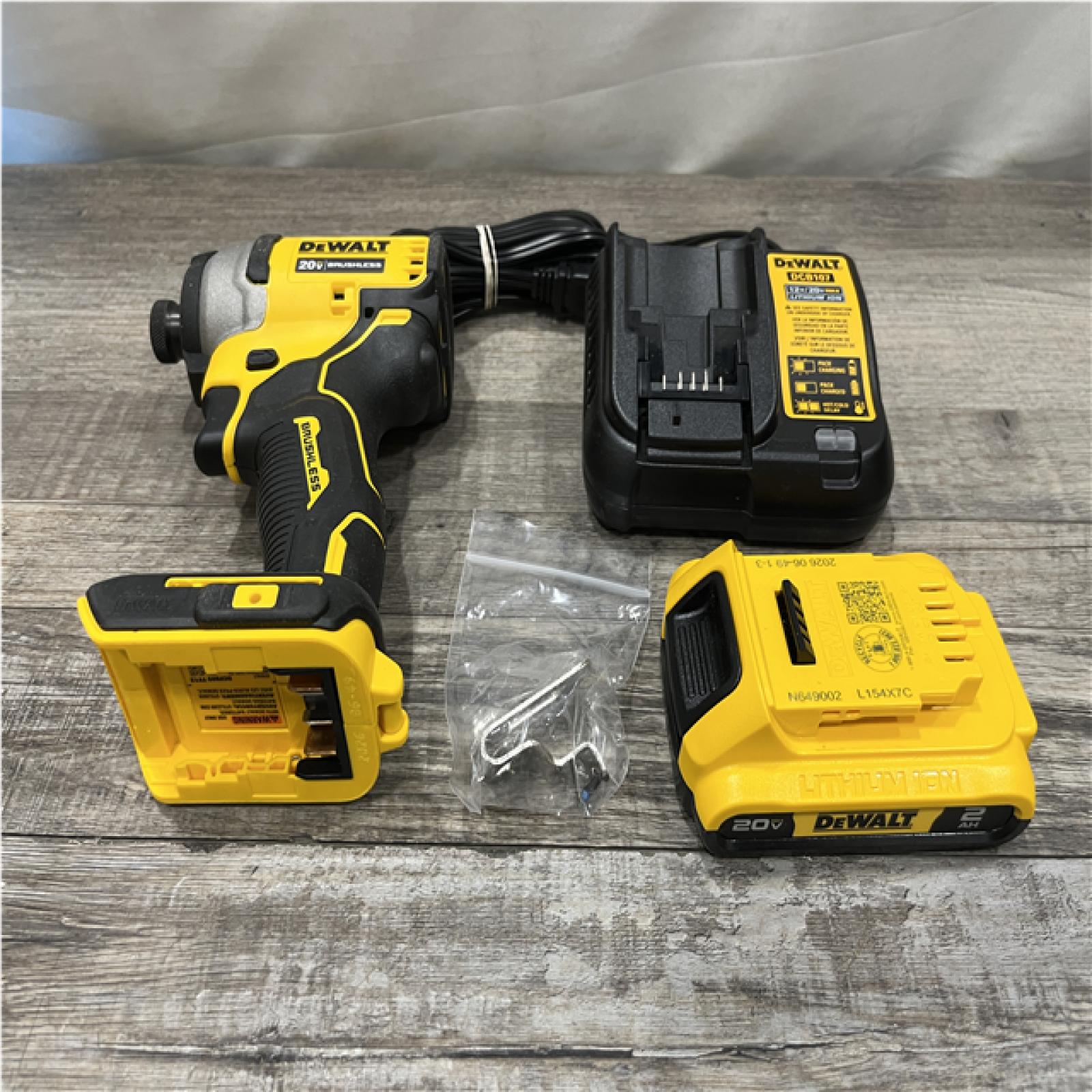 AS-IS DEWALT Atomic 20V Max Lithium-Ion Brushless Cordless Compact 1/4 in. Impact Driver Kit