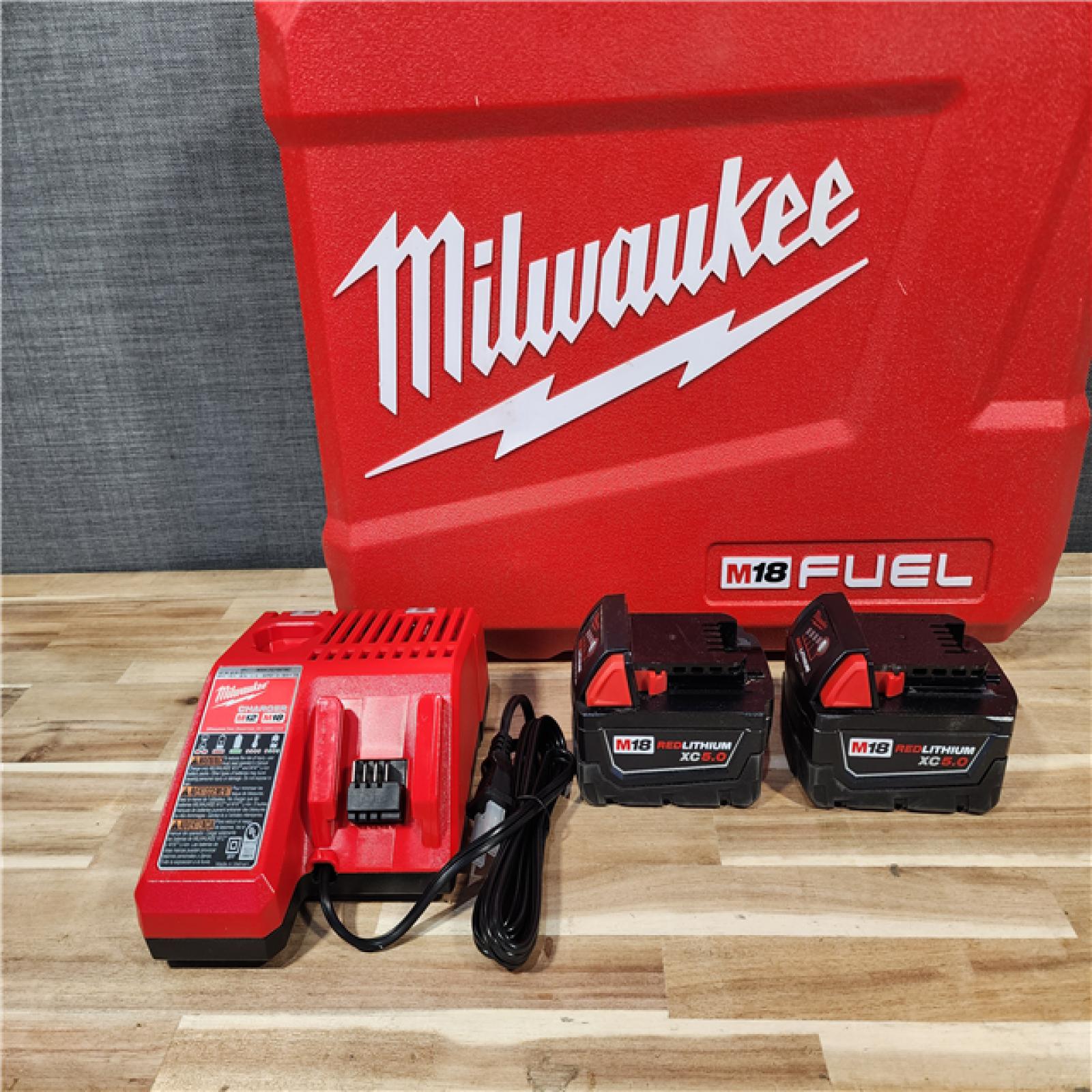 HOUSTON LOCATION - AS-IS Milwaukee FUEL 18V Lithium-Ion Brushless Cordless Hammer Drill and Impact Driver Combo Kit