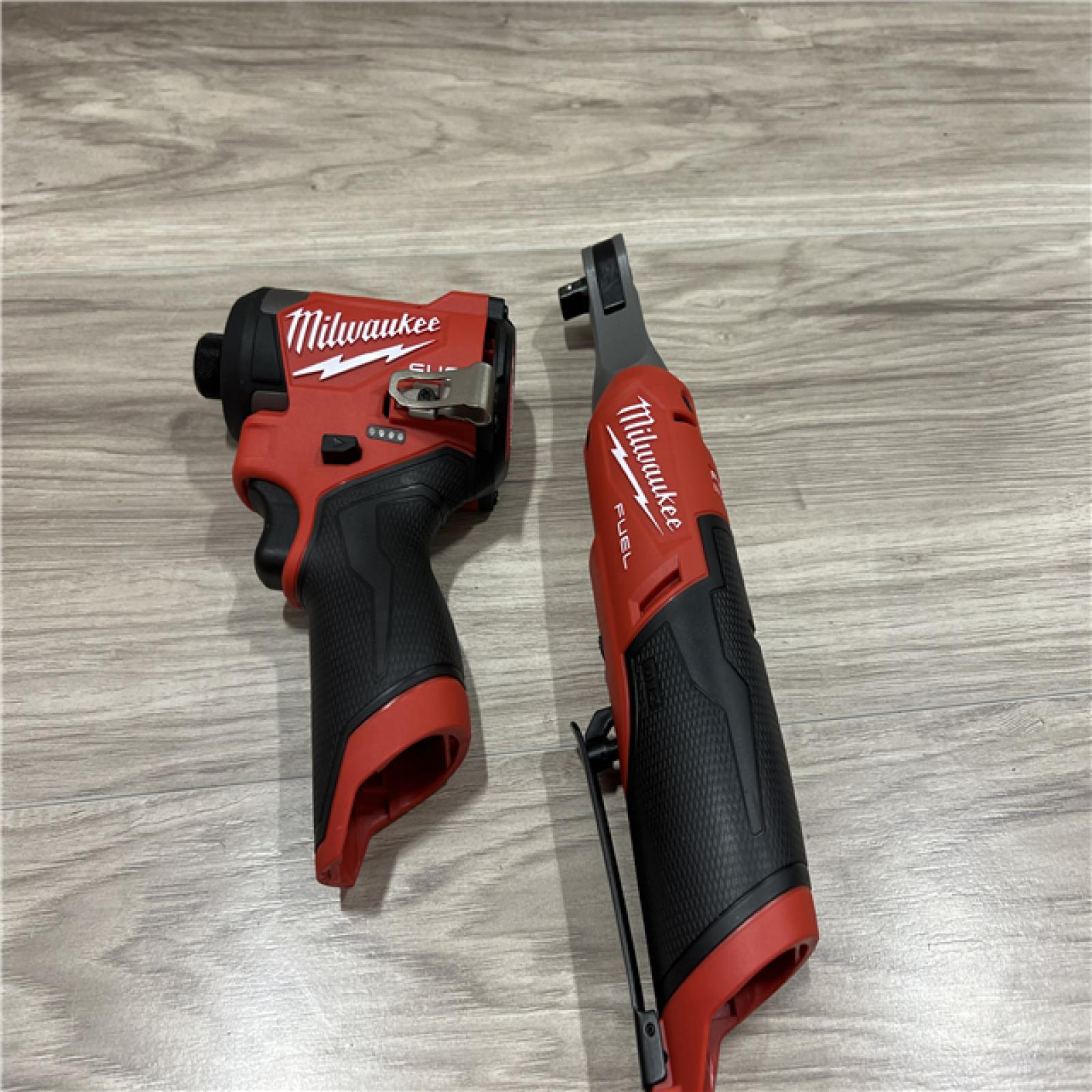 AS-IS Milwaukee FUEL 12V Lithium-Ion Cordless 3/8 in. Ratchet and 1/4 in. Impact Driver Kit
