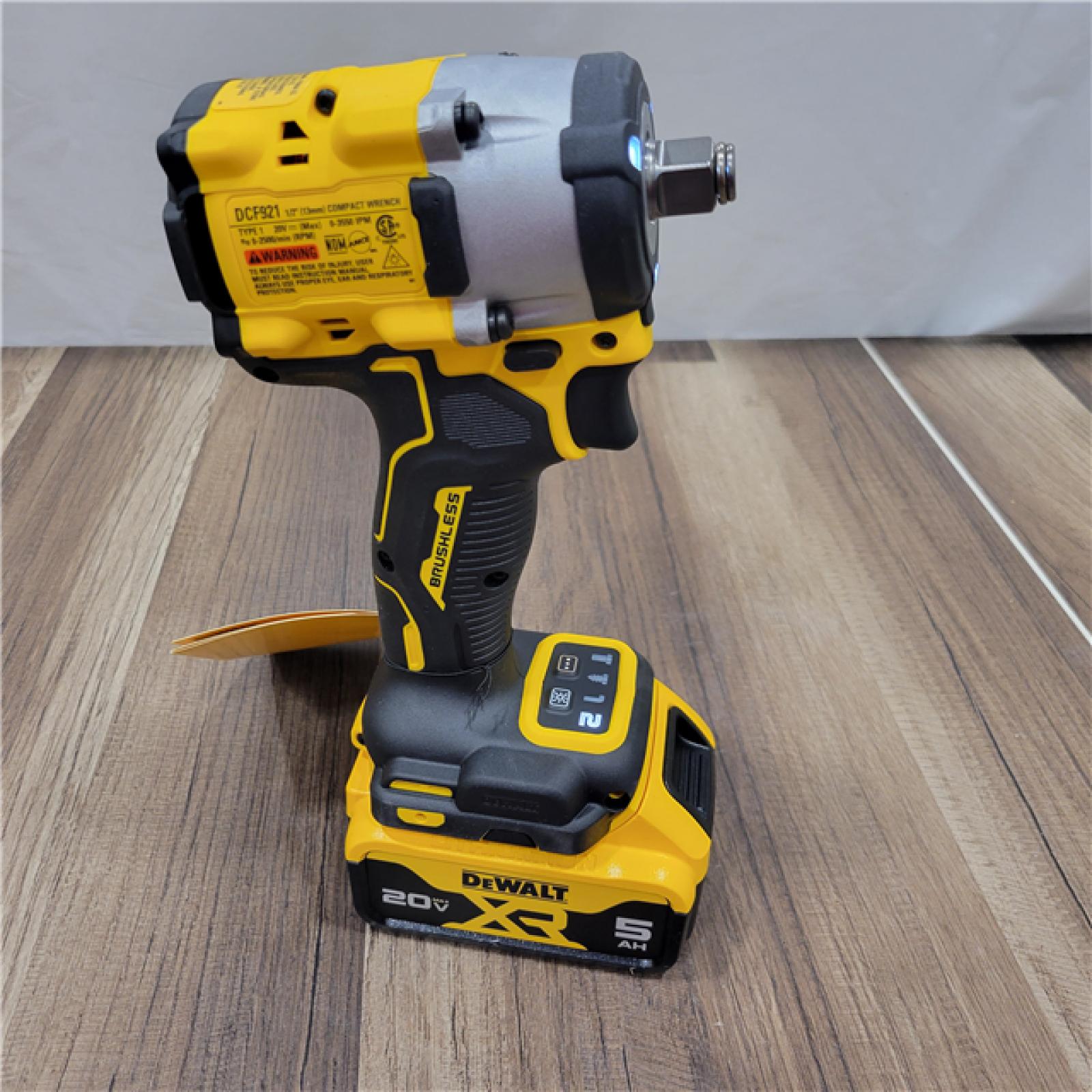 LIKE NEW! DEWALT ATOMIC 20V MAX Lithium-Ion Brushless Cordless 1/2 in. Variable Speed Impact Wrench Kit with 5 Ah Battery and Charger