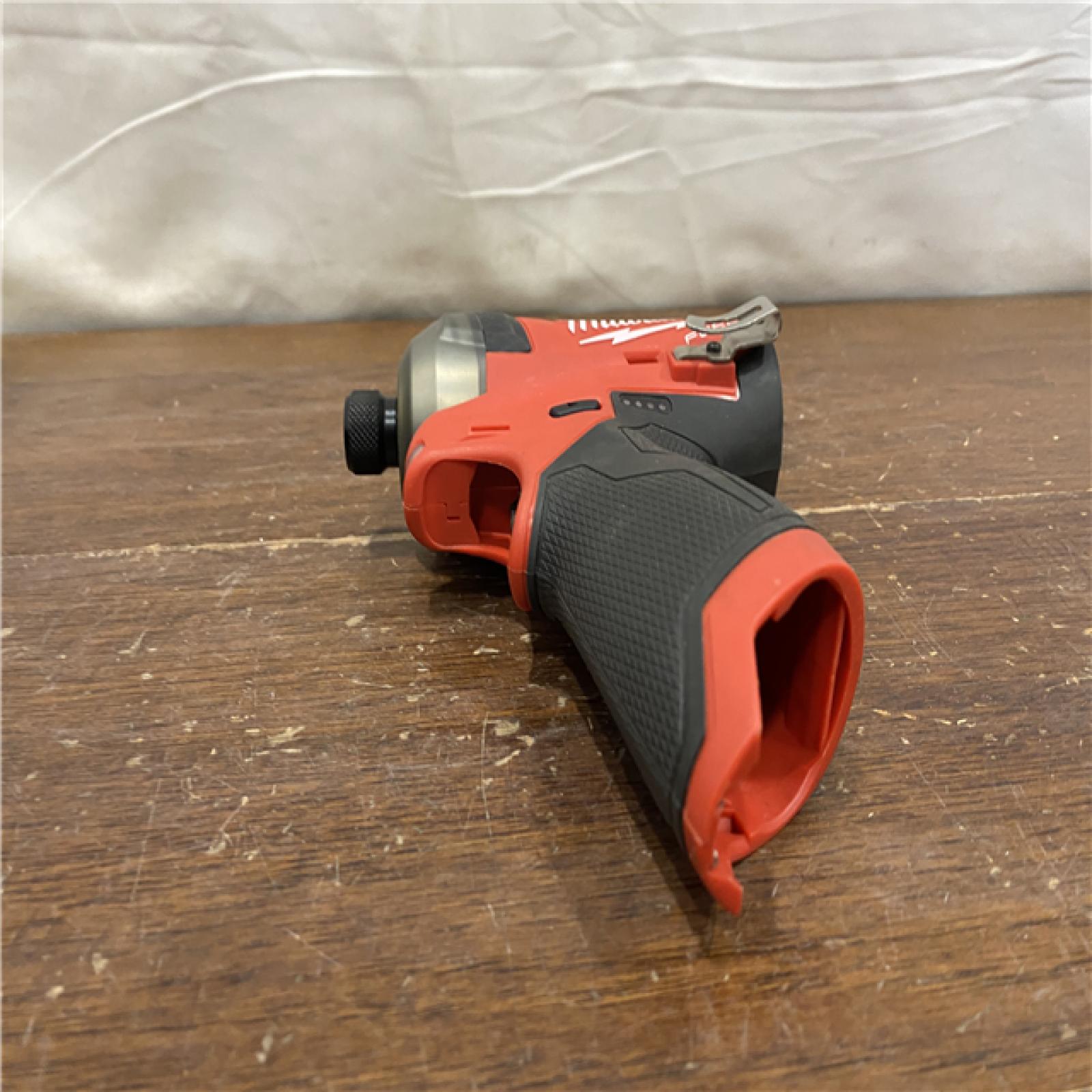AS-IS M12 FUEL SURGE 12V Lithium-Ion Brushless Cordless 1/4 in. Hex Impact Driver Compact Kit W/Two 2.0Ah Batteries, Bag