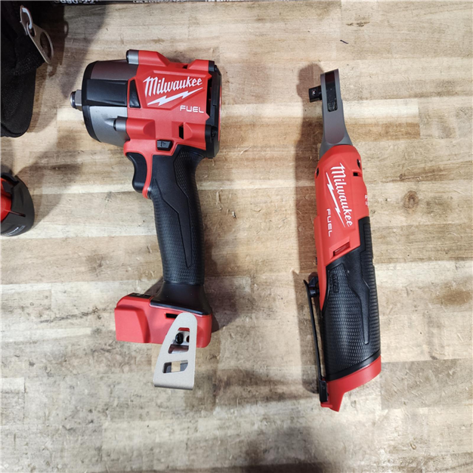 HOUSTON LOCATION - AS-IS (APPEARS LIKE NEW) Milwaukee FUEL 18V Cordless Mid Torque 1/2 in. Impact Wrench w/ M12 FUEL 3/8 in. Ratchet & Battery/Charger Combo Kit