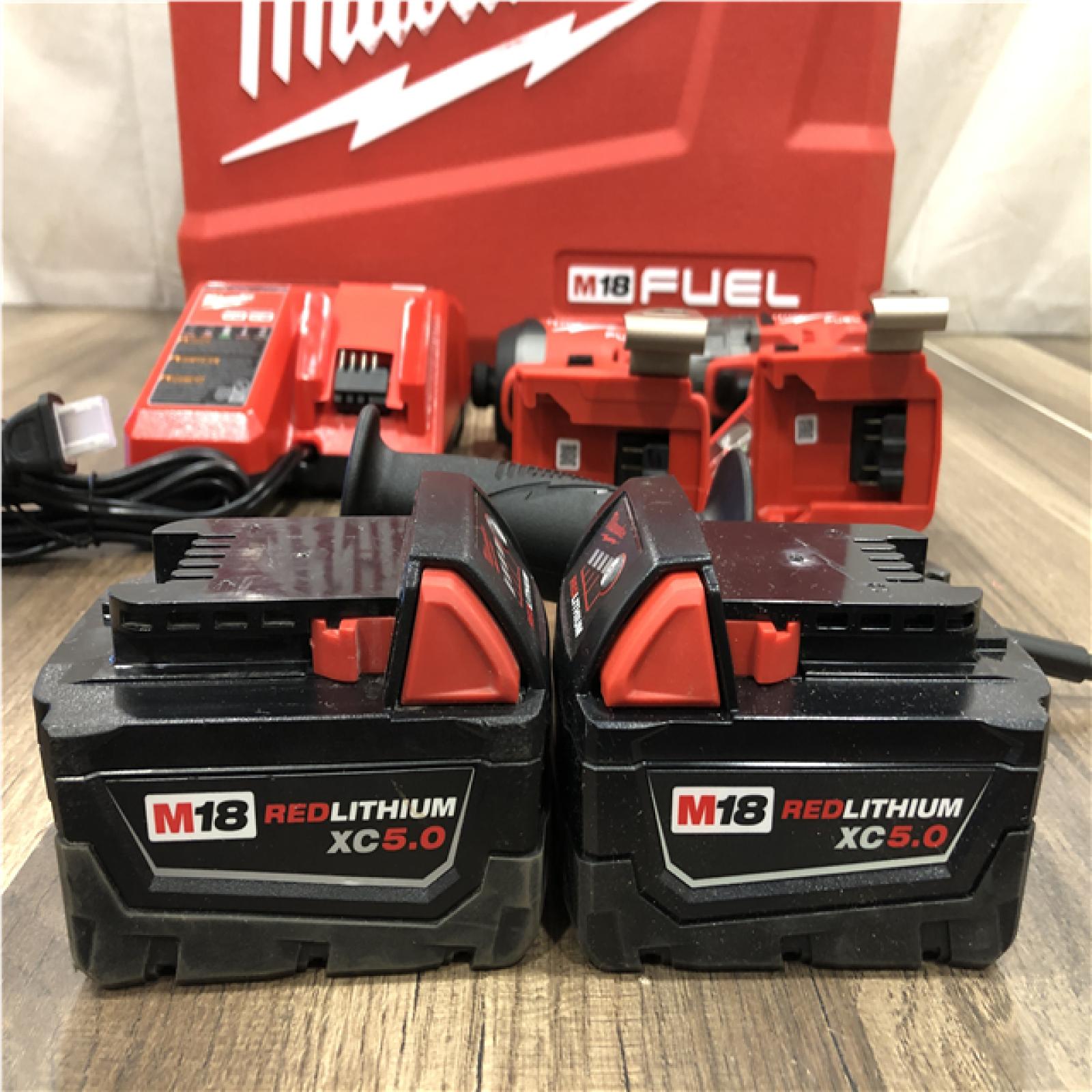 AS-IS Milwaukee FUEL 18V Lithium-Ion Brushless Cordless Hammer Drill and Impact Driver Combo Kit