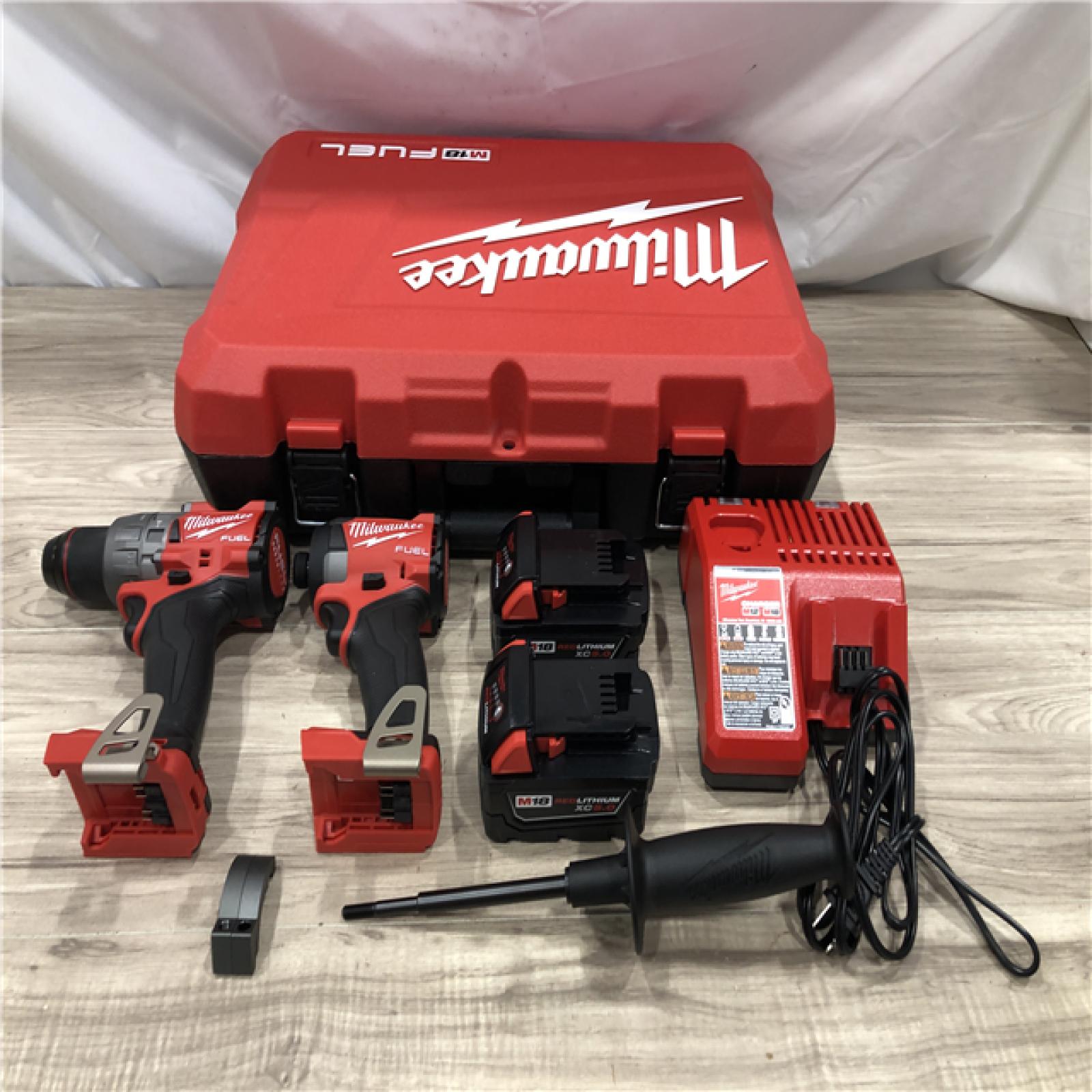 AS-IS Milwaukee FUEL 18V Lithium-Ion Cordless Hammer Drill and Impact Driver Combo Kit