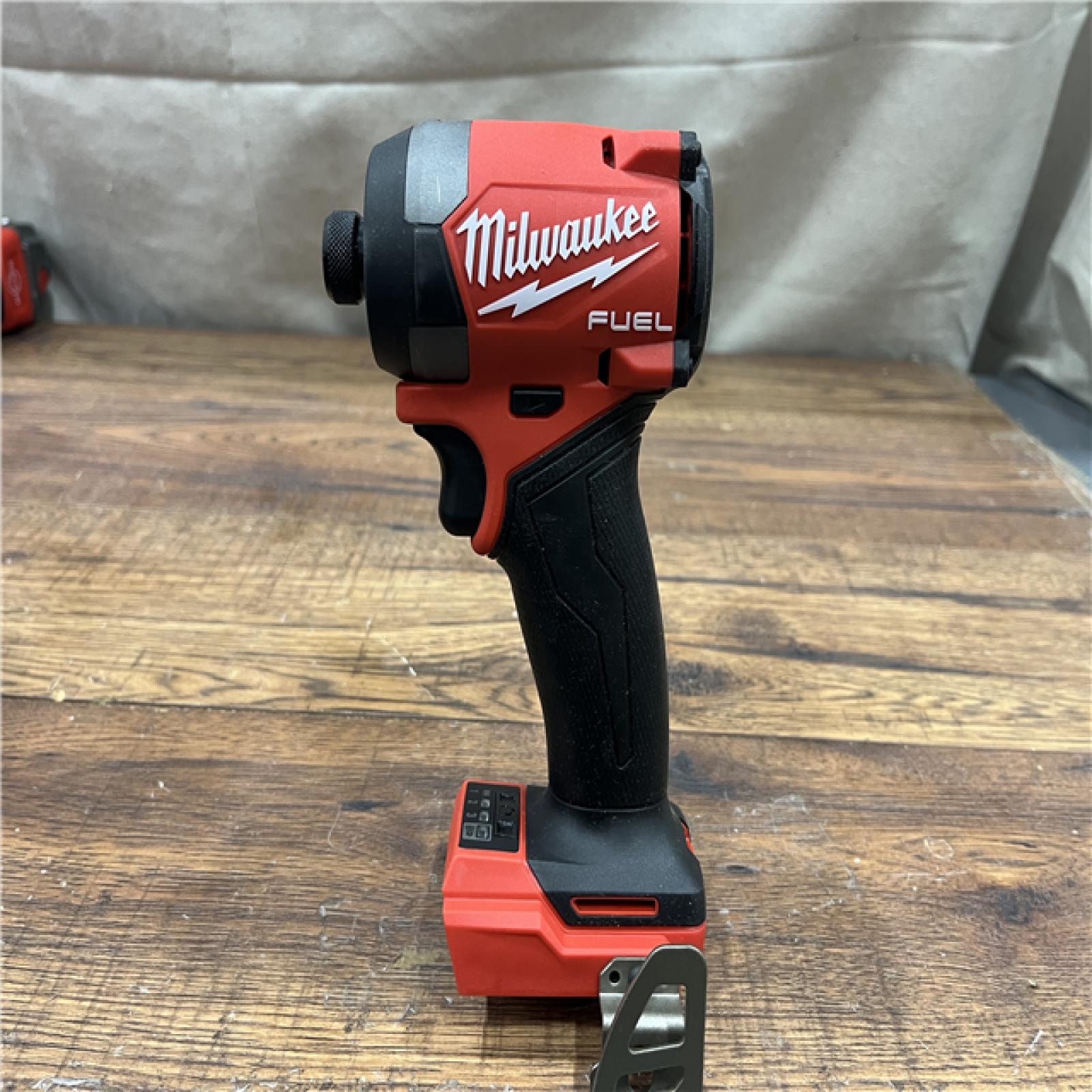 AS-IS MILWAUKEE M18 18-Volt Lithium-Ion Brushless Cordless FUEL Combo Kit (5-Tool) with 2-Batteries, 1-Charger, and Tool Bag