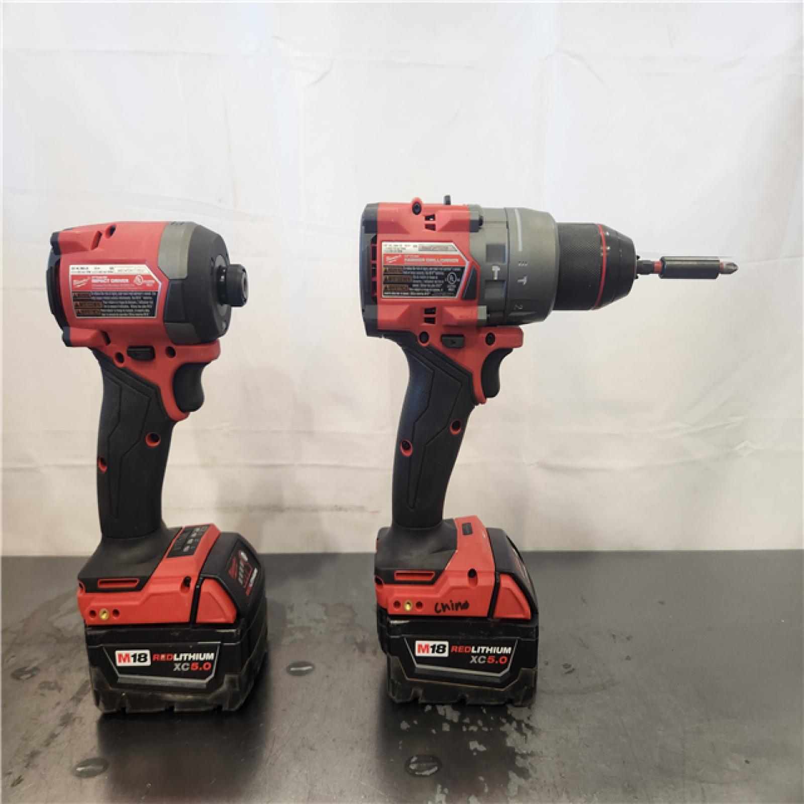 AS-IS- Milwaukee FUEL 18V Lithium-Ion Brushless Cordless Hammer Drill and Impact Driver Combo Kit