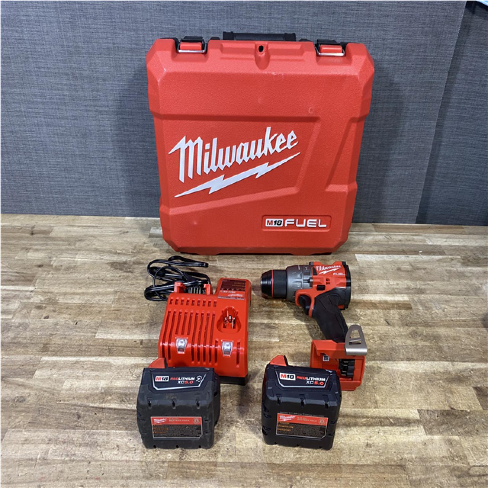 Houston Location AS-IS Milwaukee FUEL 18V Lithium-Ion Brushless Cordless 1/2 in. Hammer Drill Driver Kit