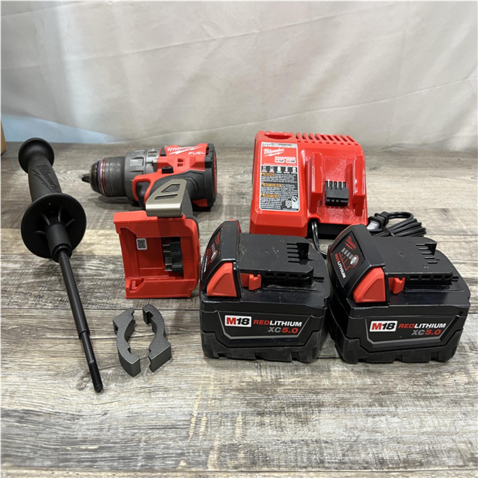 AS-IS Milwaukee FUEL 18V Lithium-Ion Brushless Cordless 1/2 in. Hammer Drill Driver Kit