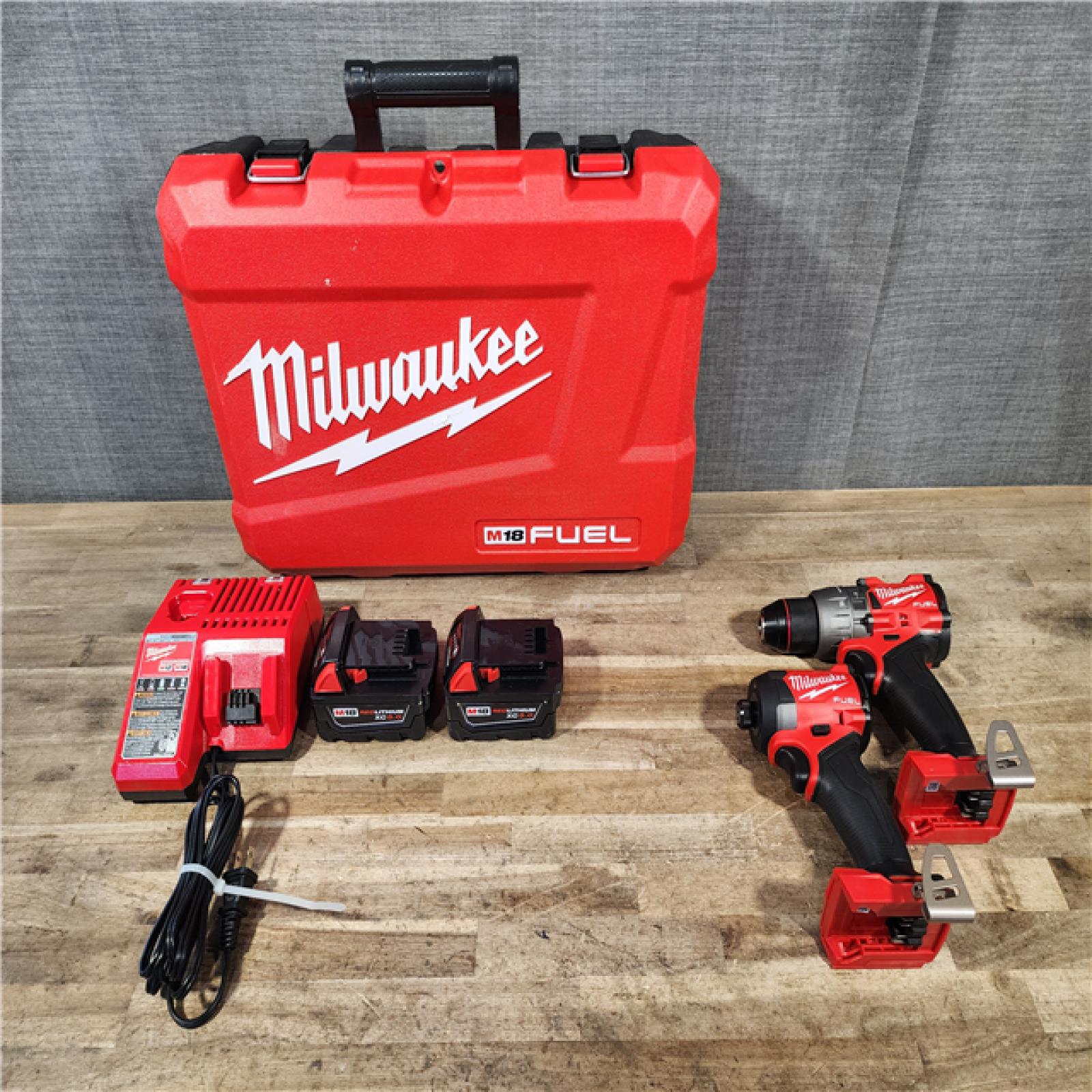 HOUSTON LOCATION - AS-IS (APPEARS LIKE NEW) Milwaukee FUEL 18V Lithium-Ion Brushless Cordless Hammer Drill and Impact Driver Combo Kit