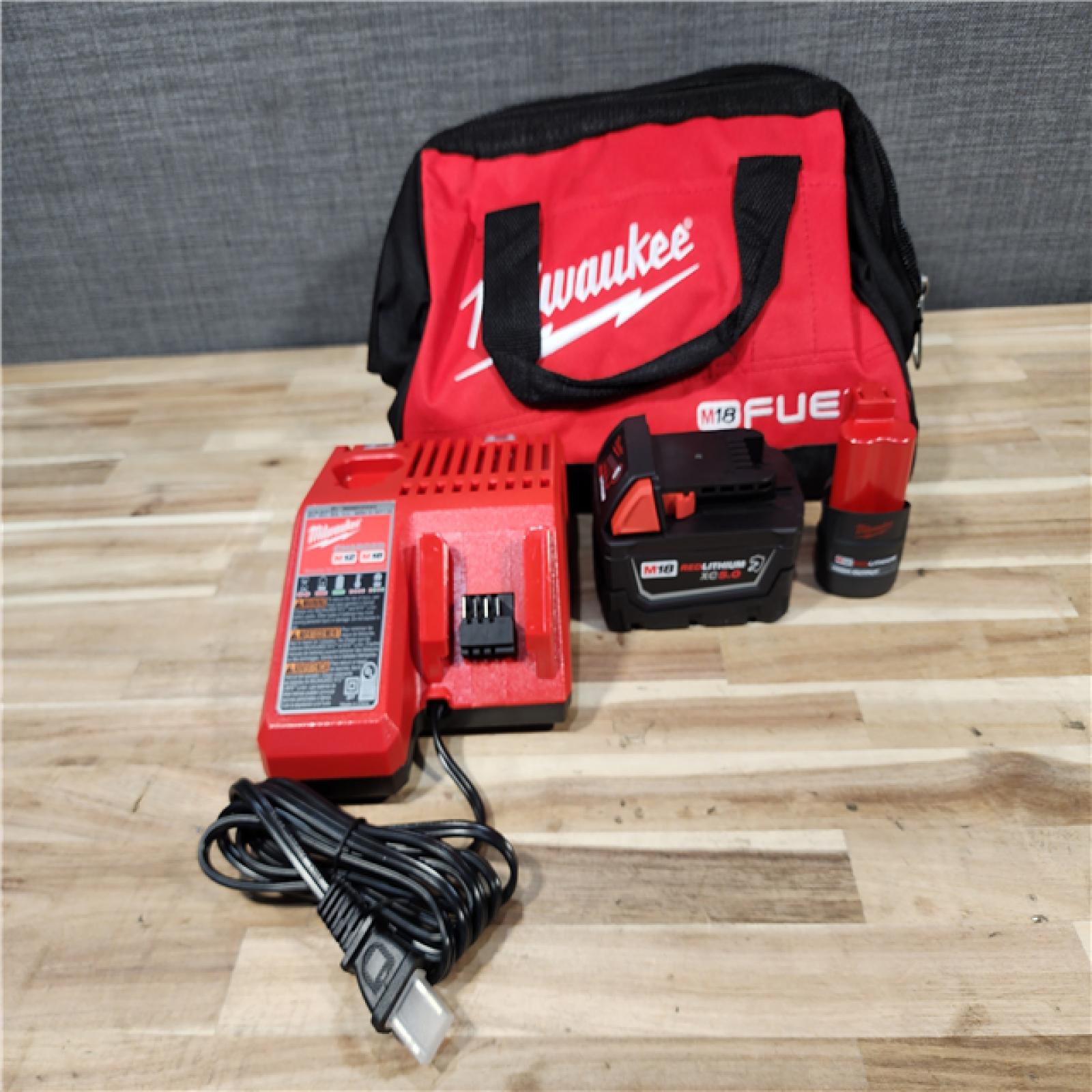 HOUSTON LOCATION - AS-IS Milwaukee FUEL 18V Cordless Mid Torque 1/2 in. Impact Wrench w/ M12 FUEL 3/8 in. Ratchet & Battery/Charger Combo Kit