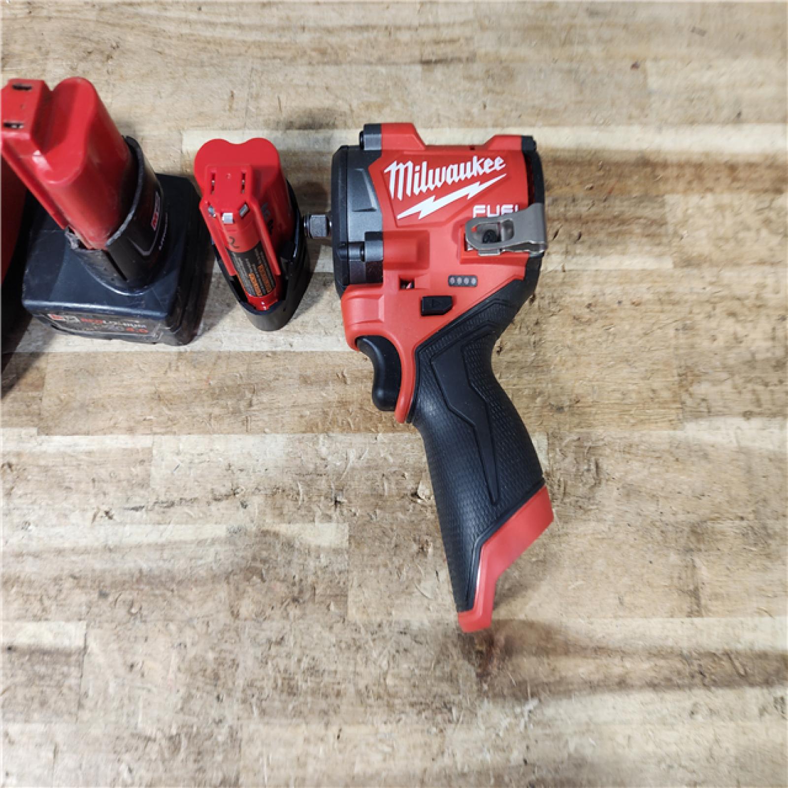 HOUSTON LOCATION - AS - IS Milwaukee FUEL 12V Li-Ion Brushless Cordless Stubby 3/8 in. Impact Wrench Kit