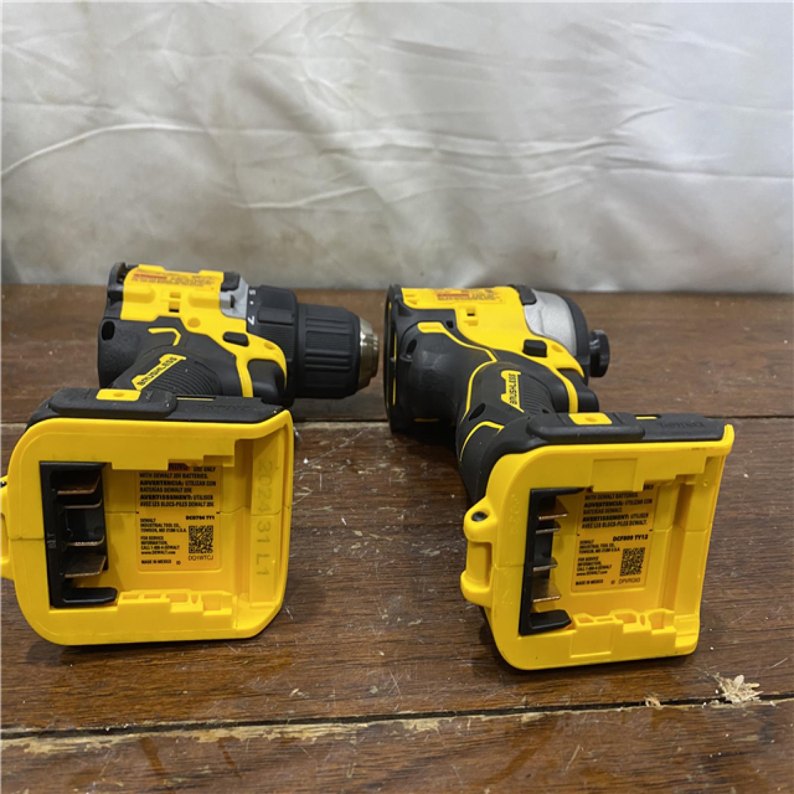 AS-IS Dewalt DCK225D2 20V MAX ATOMIC Brushless Compact Lithium-Ion 1/2 in. Cordless Drill Driver and 1/4 in. Impact Driver Combo Kit with 2 Batteries 2 Ah
