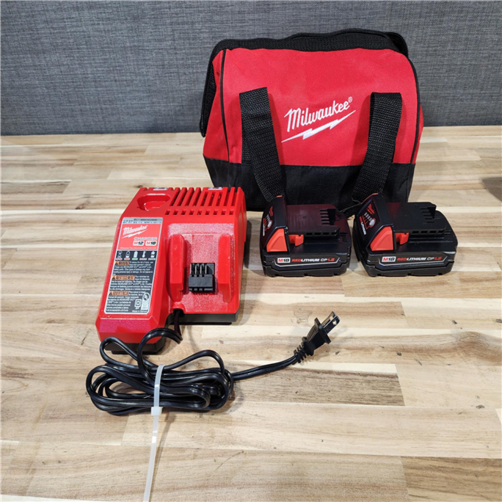 HOUSTON LOCATION - AS-IS Milwaukee 18V Lithium-Ion Cordless Drill Driver/Impact Driver Combo Kit