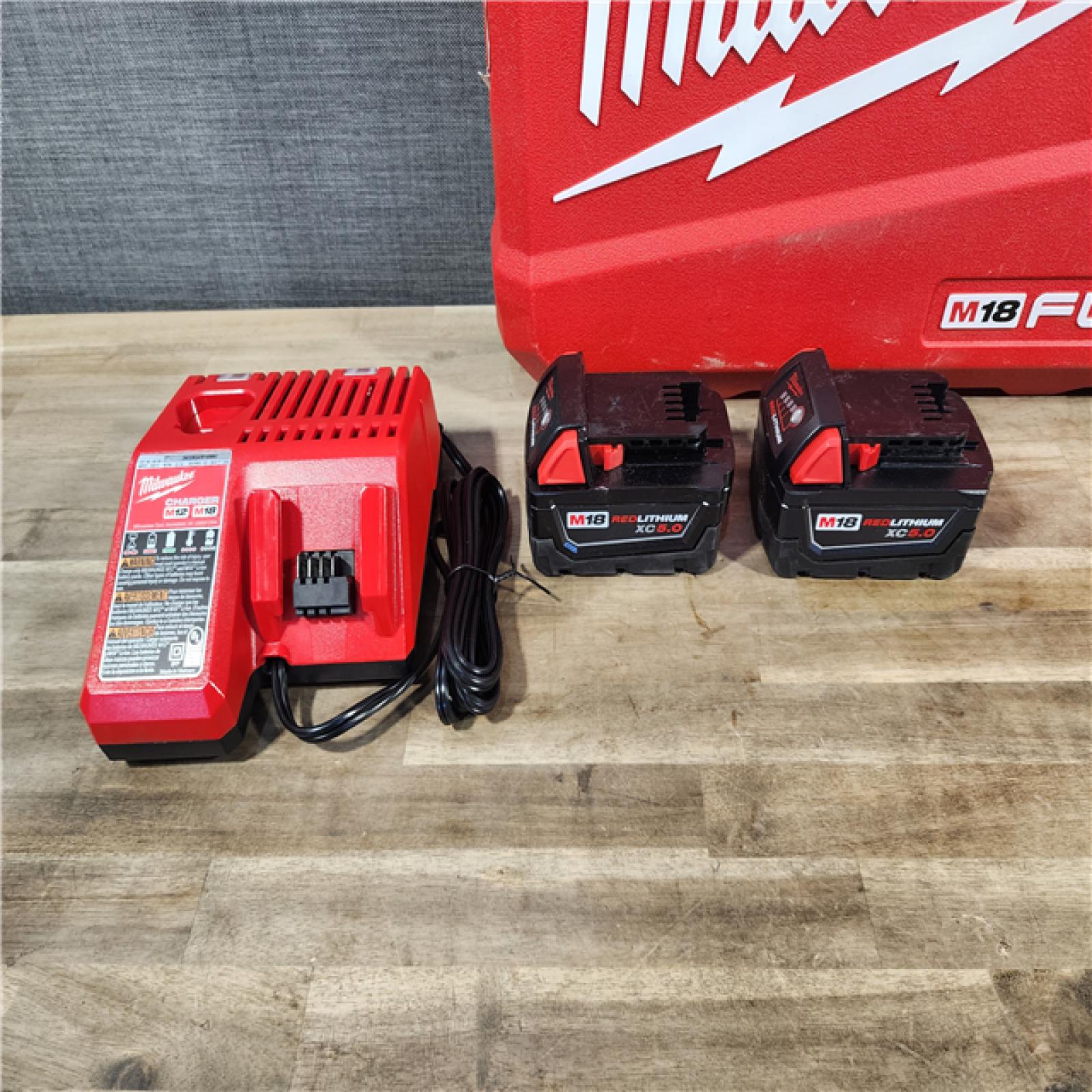 HOUSTON LOCATION - AS-IS MILWAUKEE M18 FUEL 18V Lithium-Ion Brushless Cordless Hammer Drill and Impact Driver Combo Kit (2-Tool) with 2 Batteries