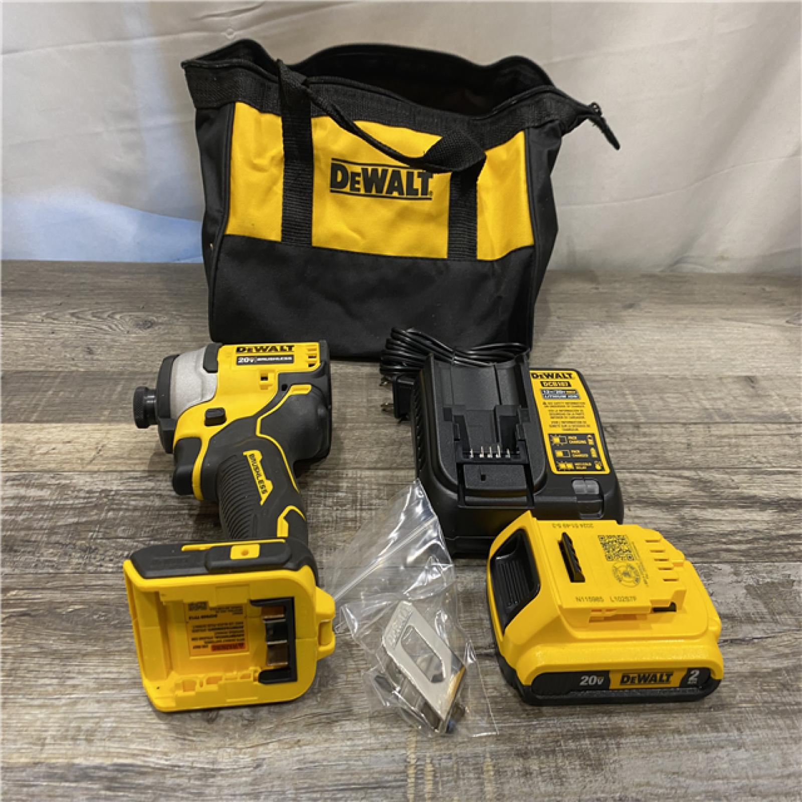 AS-IS DEWALT Atomic 20V Max Lithium-Ion Brushless Cordless Compact 1/4 in. Impact Driver Kit
