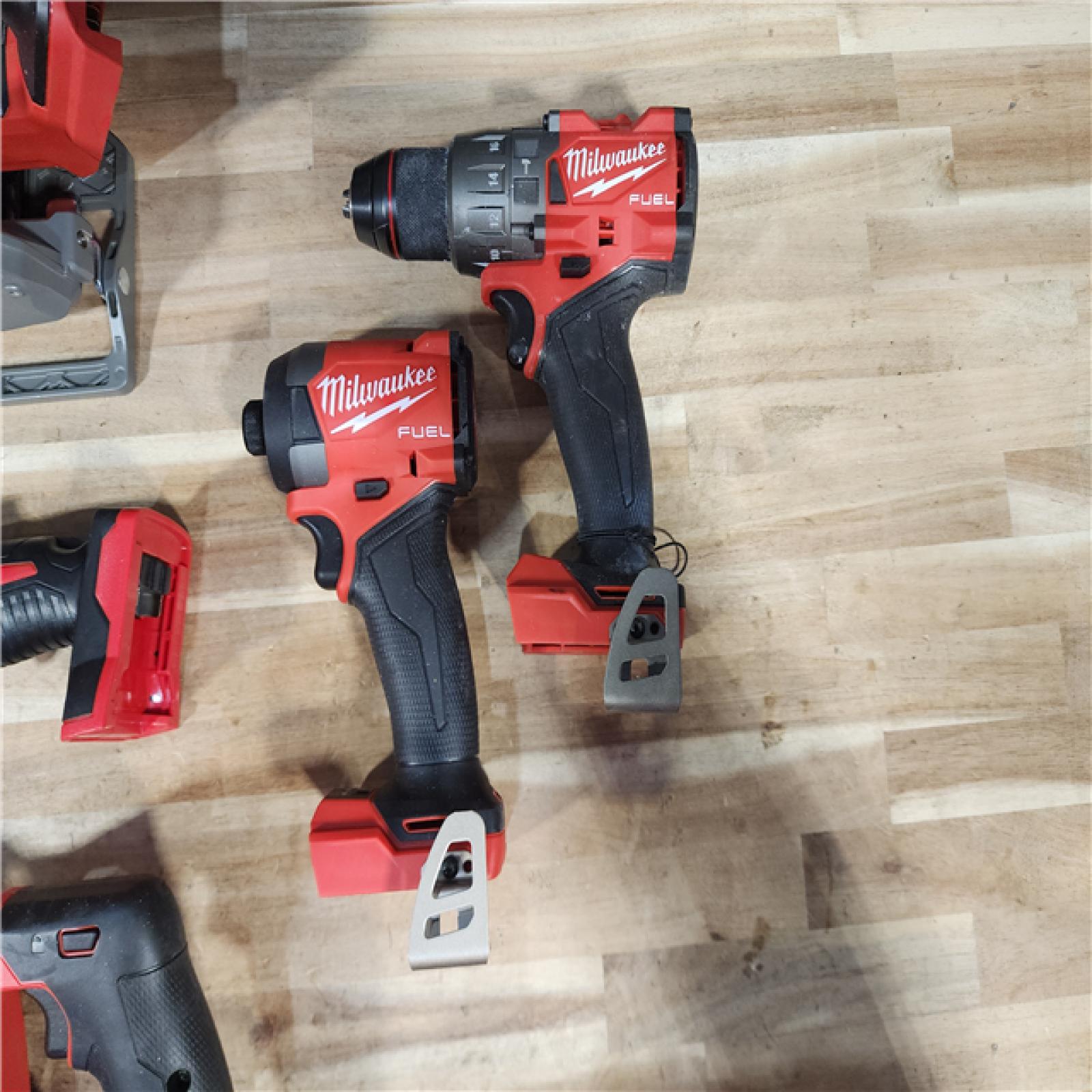HOUSTON LOCATION - AS-IS M18 FUEL 18V Lithium-Ion Brushless Cordless Combo Kit (5-Tool) with Two 5.0 Ah Batteries  1 Charger 1 Tool Bag