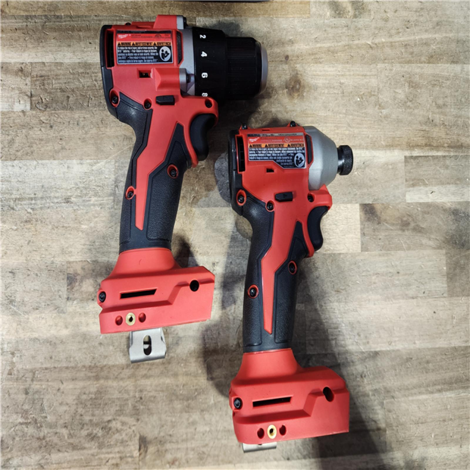 HOUSTON LOCATION - AS-IS Milwaukee M18 18V Lithium-Ion Brushless Cordless Compact Drill/Impact Combo Kit (2-Tool) W/(2) 2.0 Ah Batteries  Charger & Bag