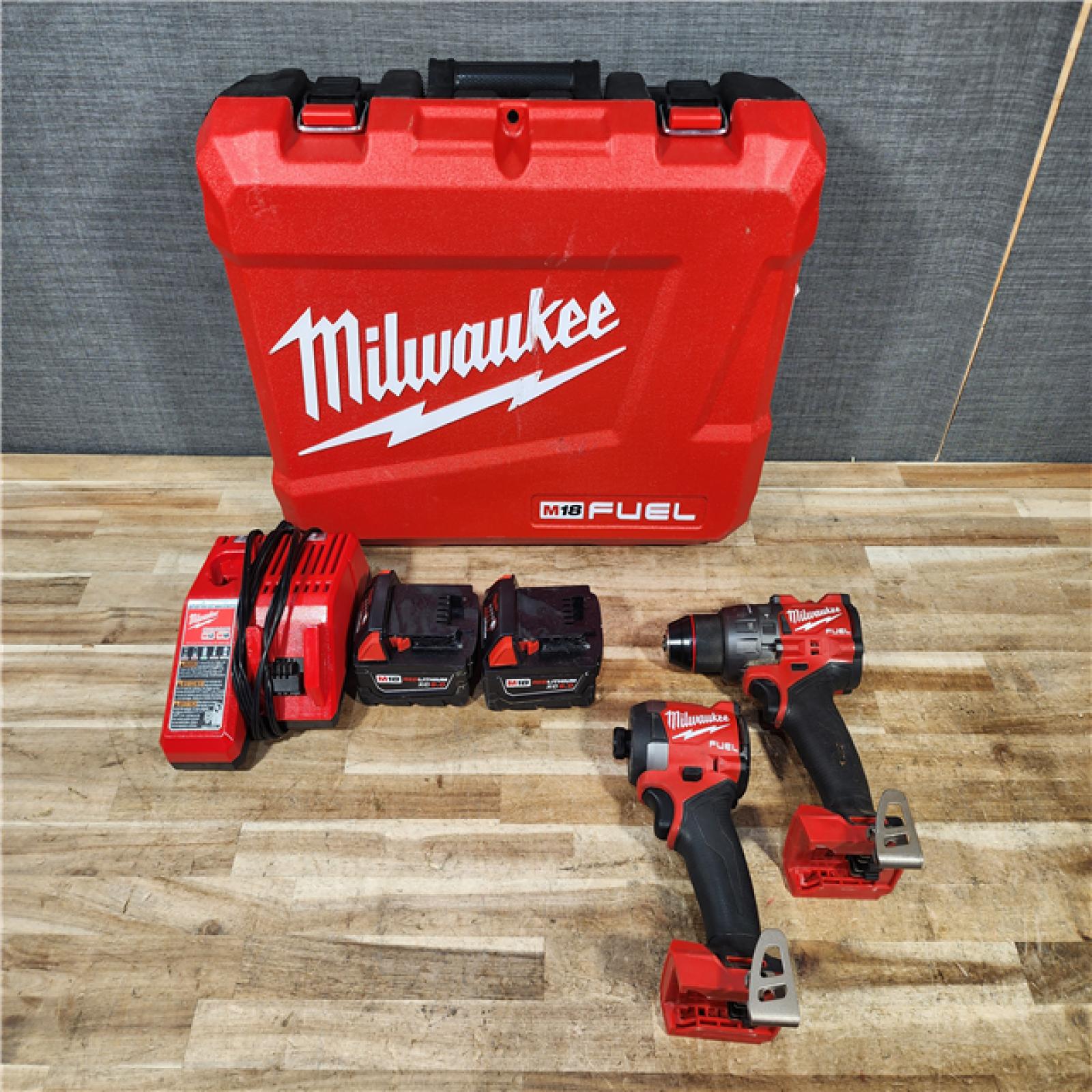 HOUSTON LOCATION - AS - IS Milwaukee FUEL 18V Lithium-Ion Brushless Cordless Hammer Drill and Impact Driver Combo Kit