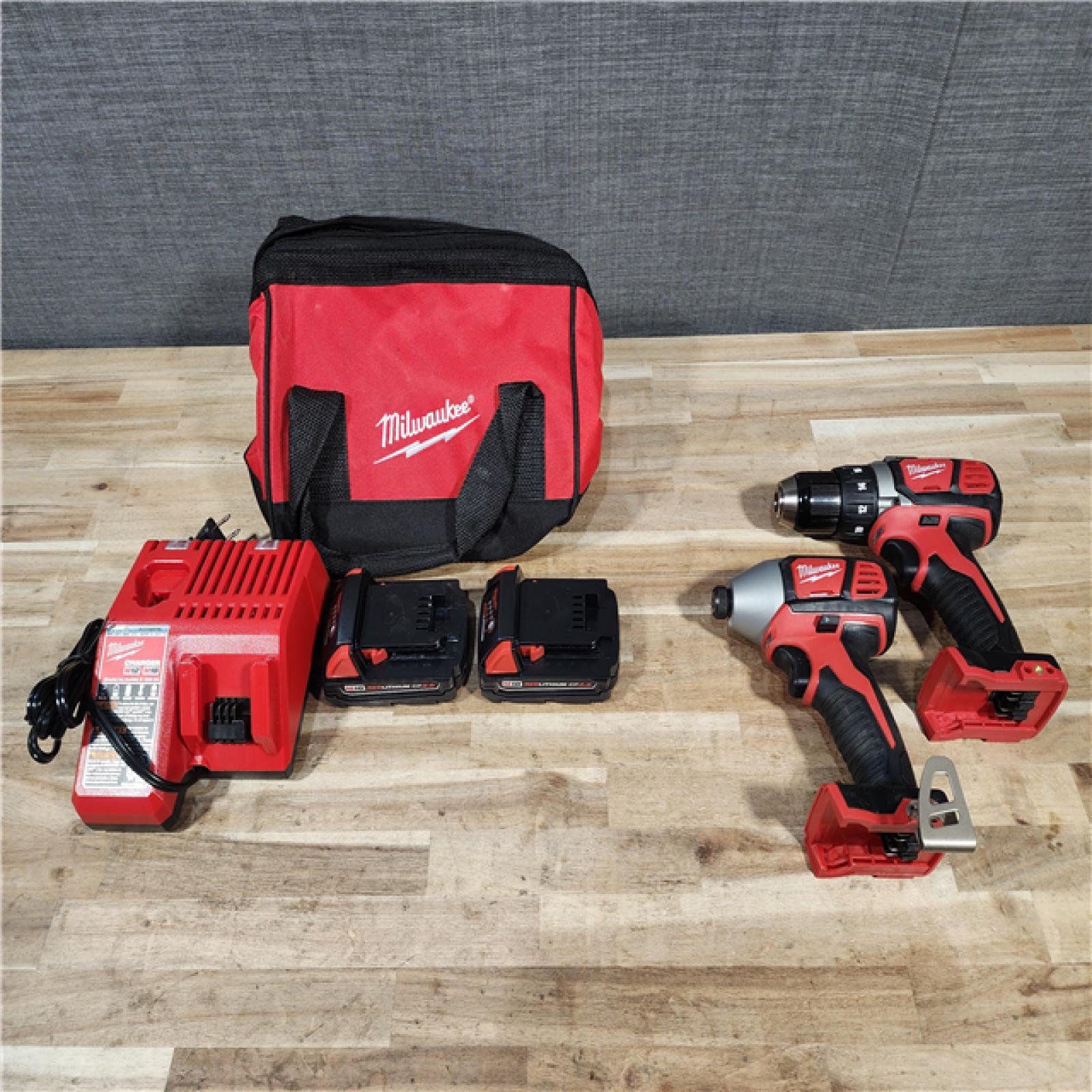 HOUSTON LOCATION - AS-IS Milwaukee 18V Lithium-Ion Cordless Drill Driver/Impact Driver Combo Kit