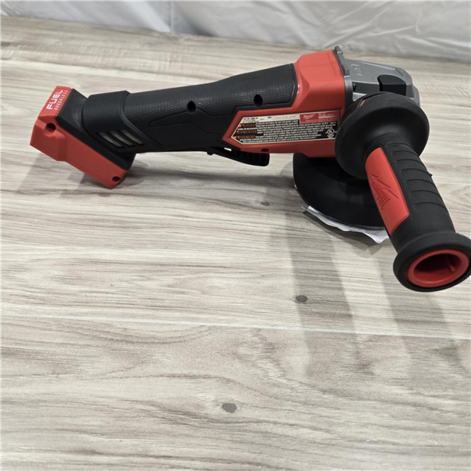 AS-IS Milwaukee 2880-20 FUEL 18-Volt Lithium-Ion Brushless Cordless 4-1/2 in./5 in. Grinder W/Paddle Switch (Tool-Only)