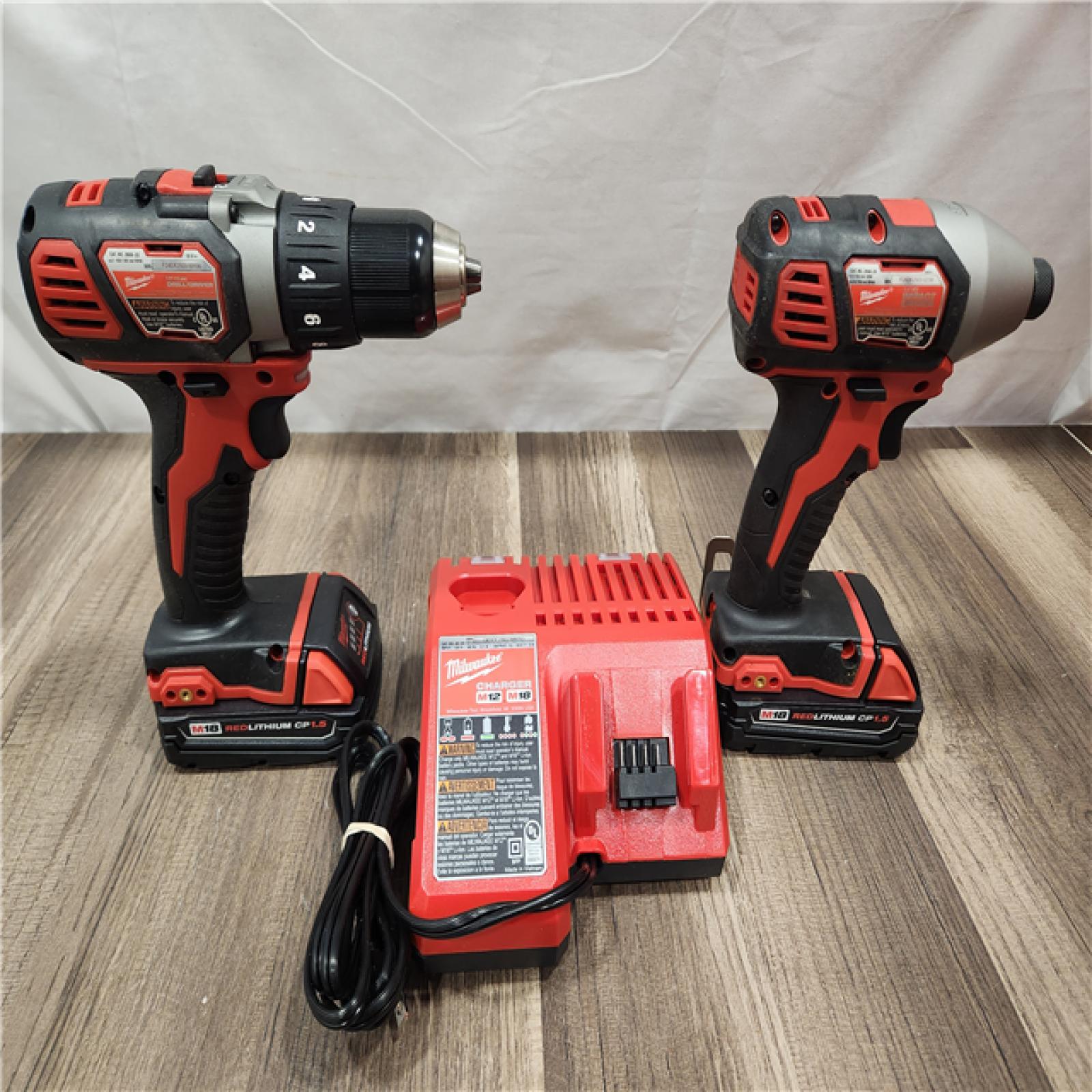 AS-IS- Milwaukee 18V Cordless Brushed 2-Tool Drill/Driver and Impact Driver Kit