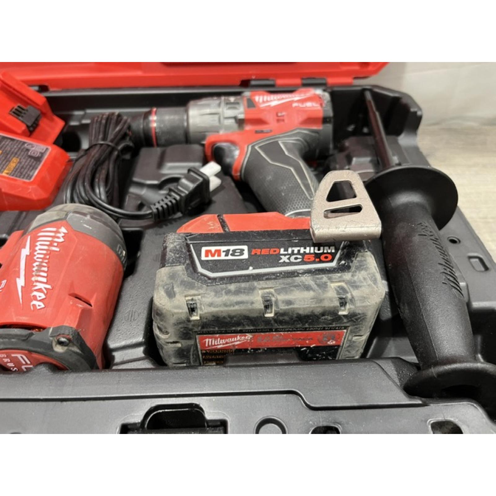 AS-IS Milwaukee FUEL 18V Lithium-Ion Brushless Cordless Hammer Drill and Impact Driver Combo Kit