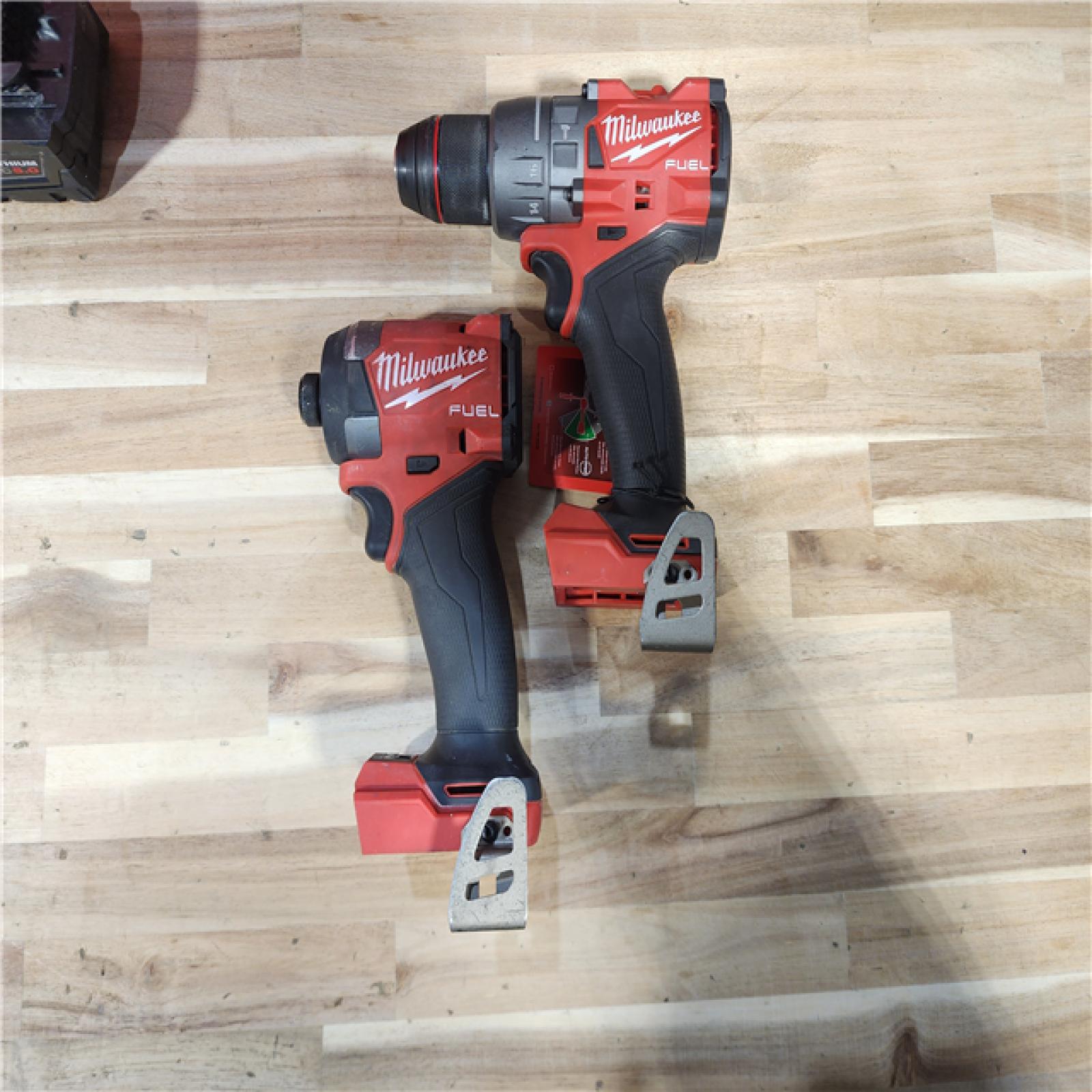 HOUSTON LOCATION - AS-IS Milwaukee FUEL 18V Lithium-Ion Brushless Cordless Hammer Drill and Impact Driver Combo Kit