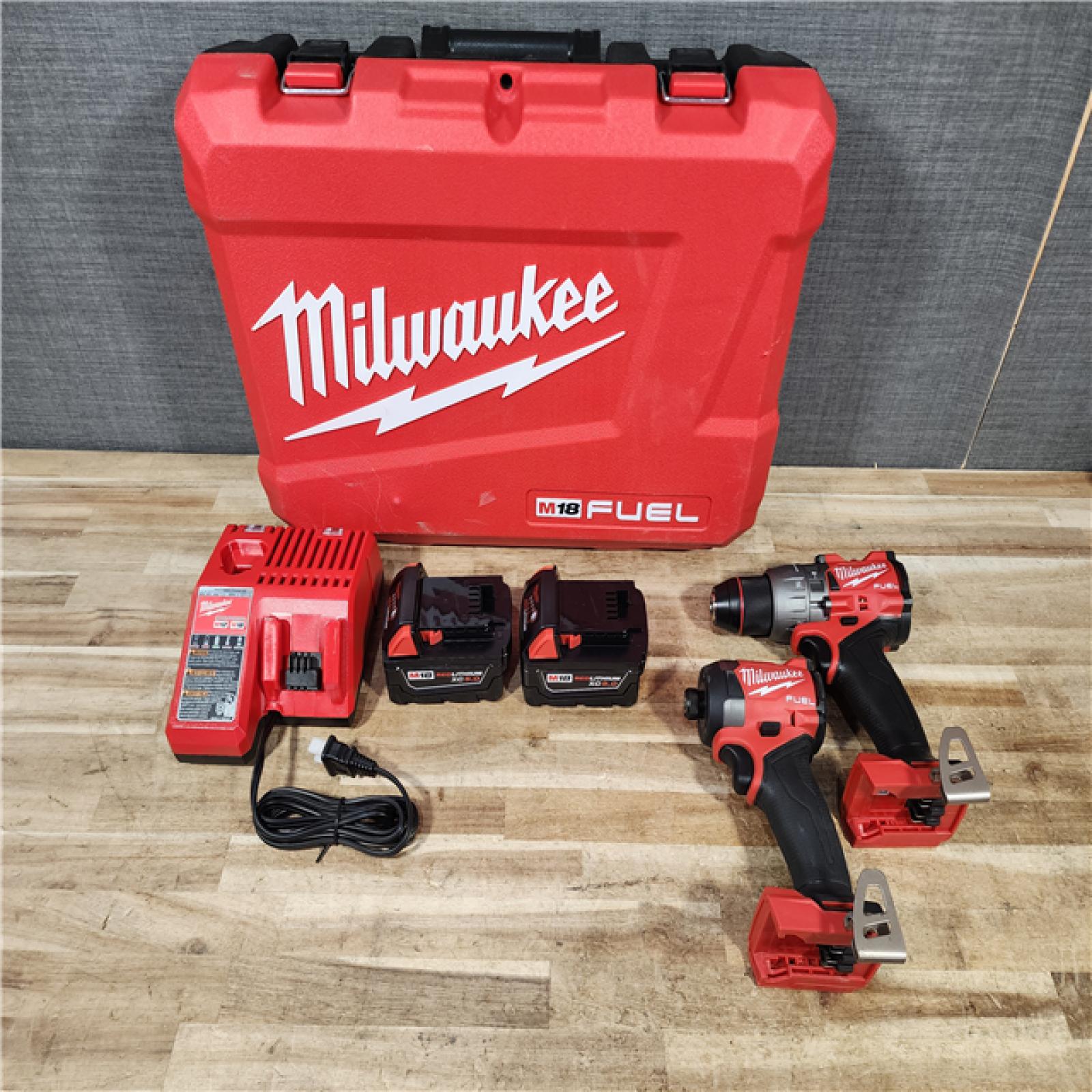 HOUSTON LOCATION - AS - IS Milwaukee FUEL 18V Lithium-Ion Brushless Cordless Hammer Drill and Impact Driver Combo Kit