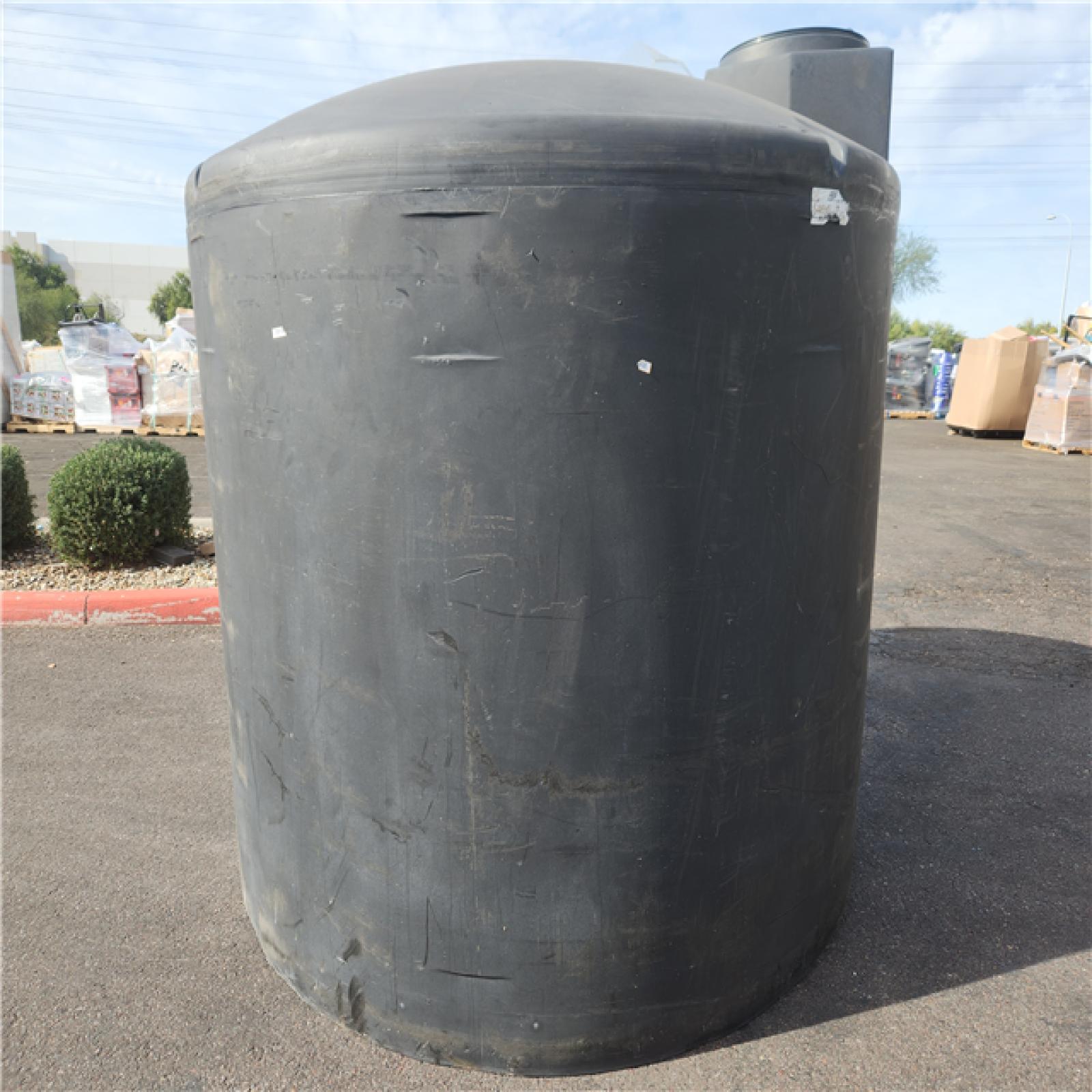 Phoenix AS-IS Tennco Techologies  Inc 1700 Gal. Black Vertical Water Storage Tank
